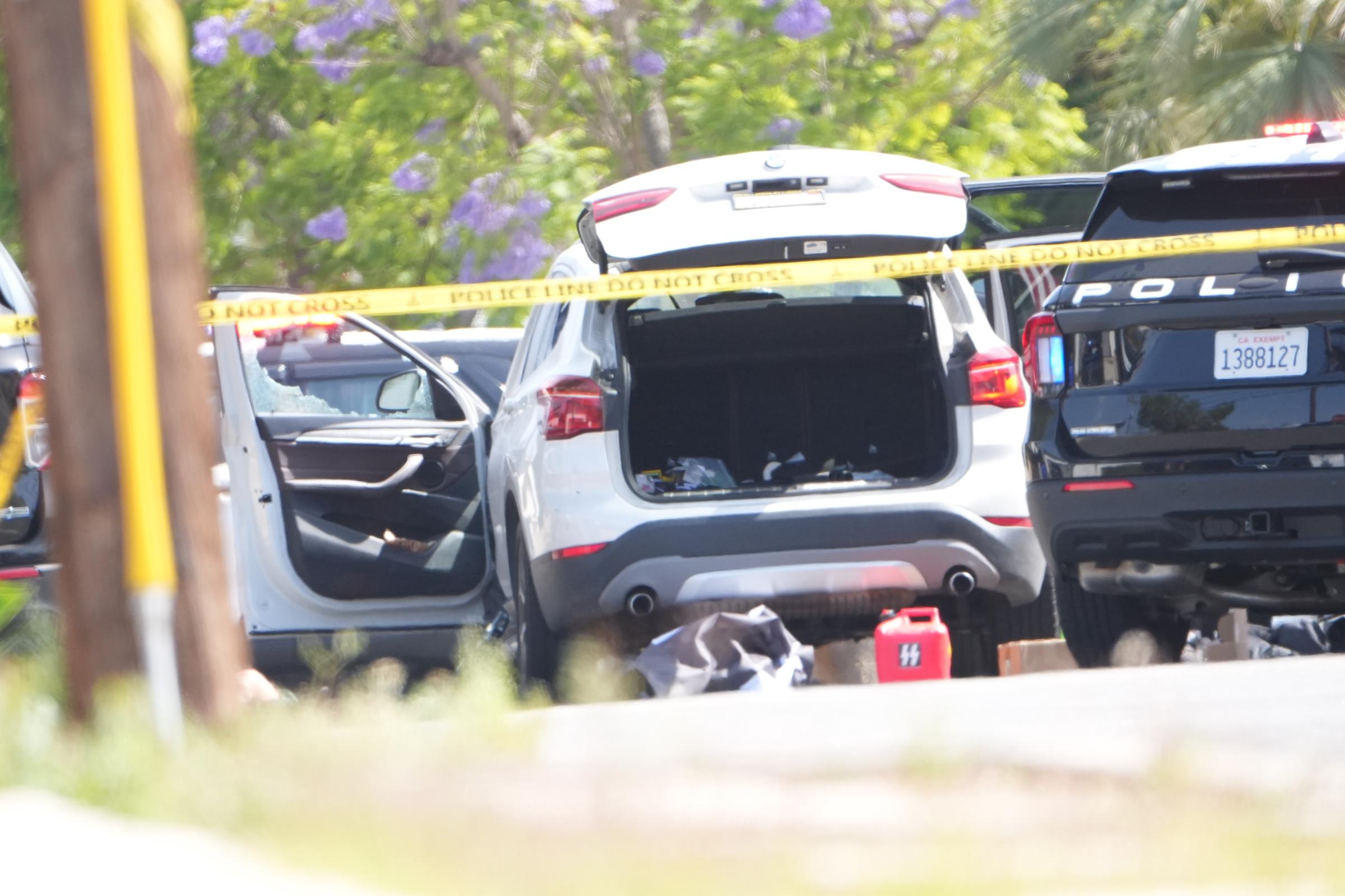 Police investigate a vehicle linked to the San Diego mosque shooting on May 18, 2026 | Source: Getty Images