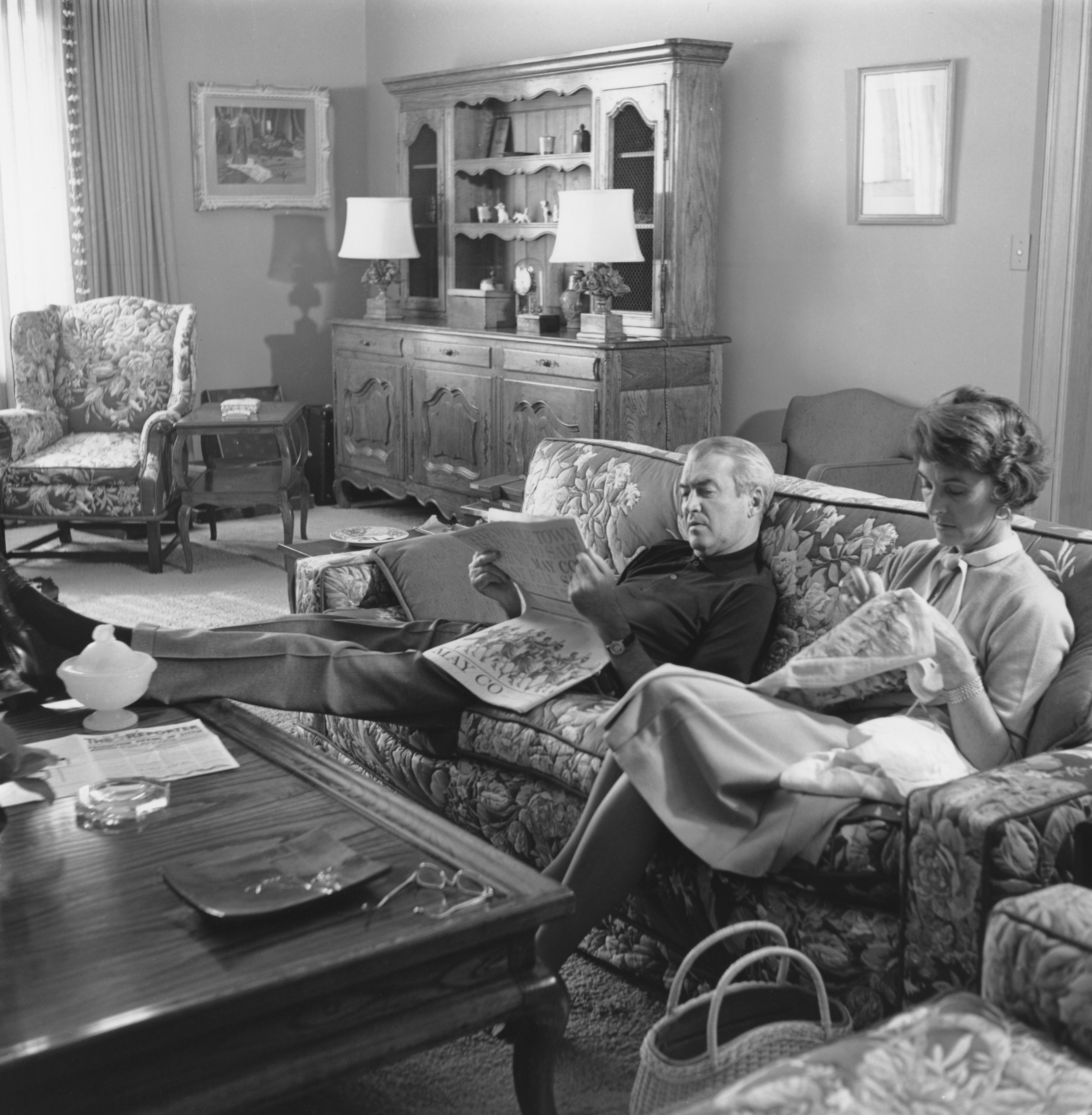 James Stewart and Gloria Hatrick McLean relaxing at home with his wife, circa 1965. | Source: Getty Images