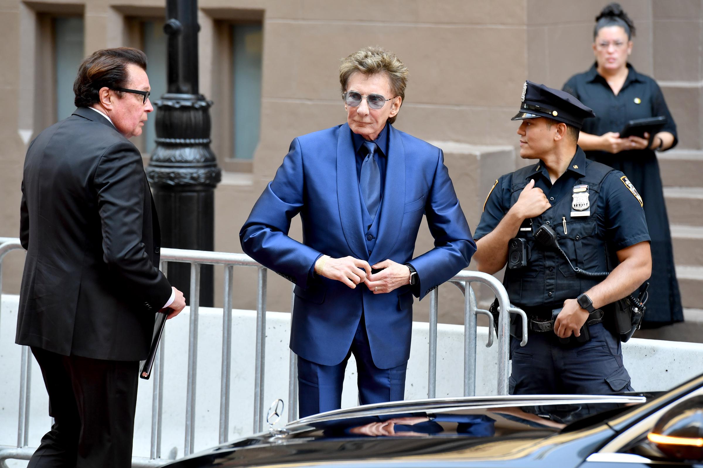 Clive Davis' impact extended across generations of artists, including contemporaries such as Barry Manilow, whose own career has produced dozens of charting hits. | Source: Getty Images