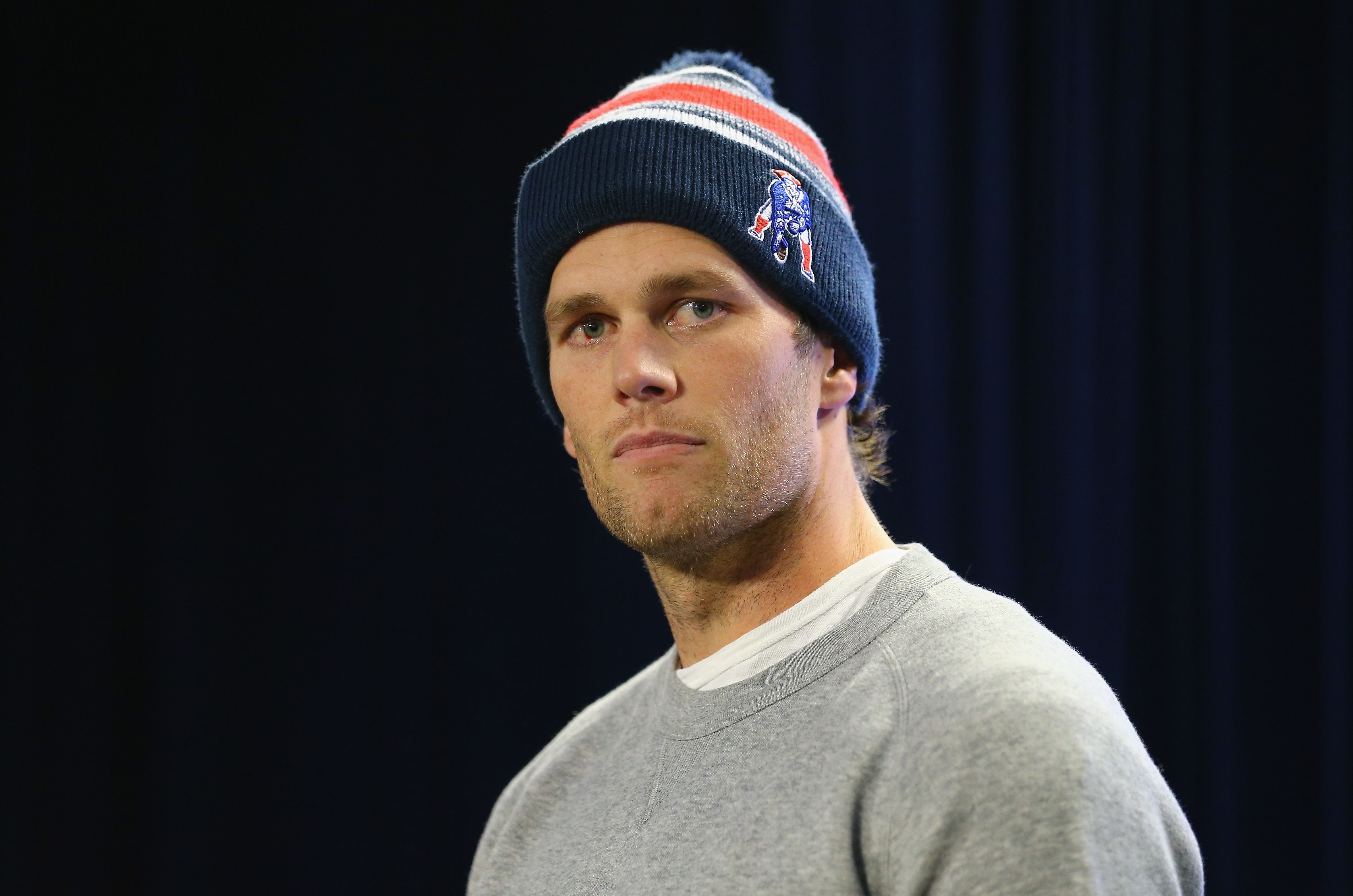 Tom Brady during a press conference to address the under inflation of footballs used in the AFC championship game on January 22, 2015, in Foxboro, Massachusetts | Photo: Maddie Meyer/Getty Images