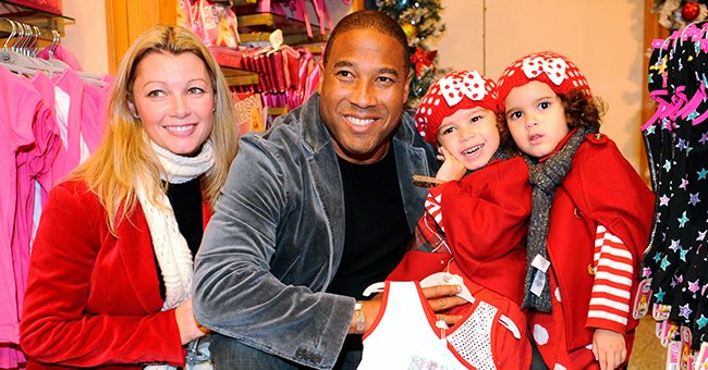 Former footballer John Barnes, with wife Andrea and daughters Isabella and Tia, who joined patients from Great Ormond Street Hospital at the Disney store in Oxford Street, London on November 4, 2009 | Photo: Getty Images