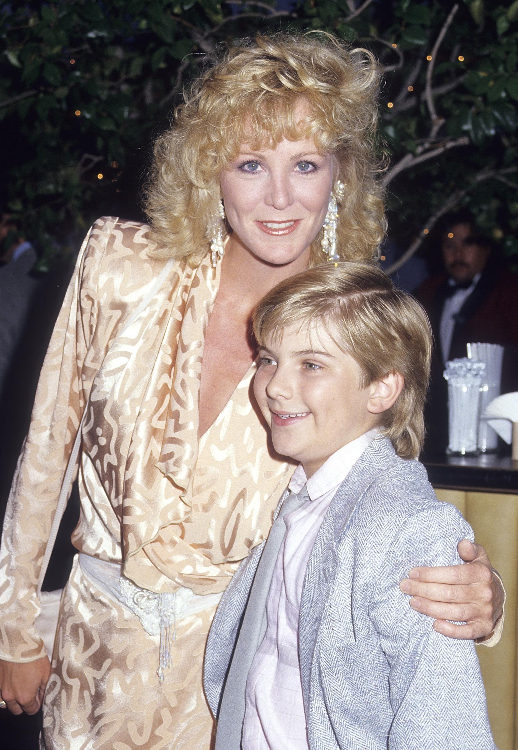 The actress is pictured with actor Jeremy Miller attending the ABC Television Affiliates Party on June 9, 1987 | Source: Getty Images