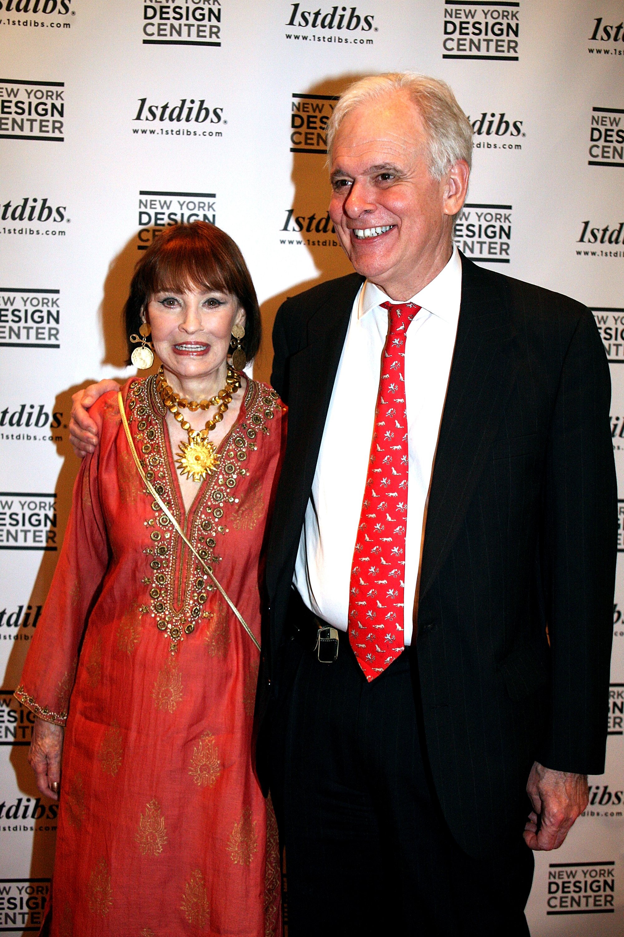 Gloria Vanderbilt and Stan Stokowski during "The World of Gloria Vanderbilt: Collages, Dream Boxes, and Recent Paintings" Preview Party Gala Benefit on September 12, 2012, in New York City. | Source: Getty Images