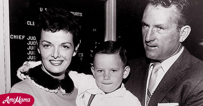 Jane Russell and her husband, Bob Waterfield, pose with their adopted son, Tommy. | Photo: Getty Images