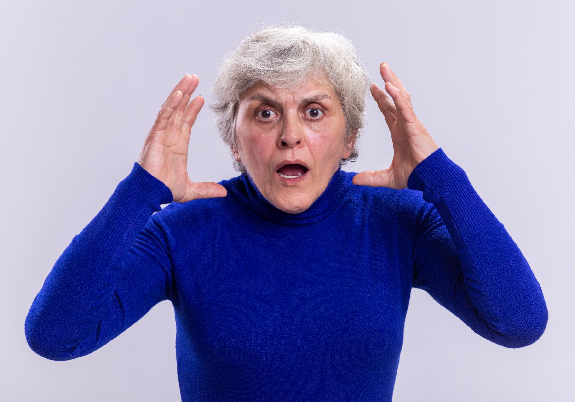 A shocked senior woman | Source: Freepik