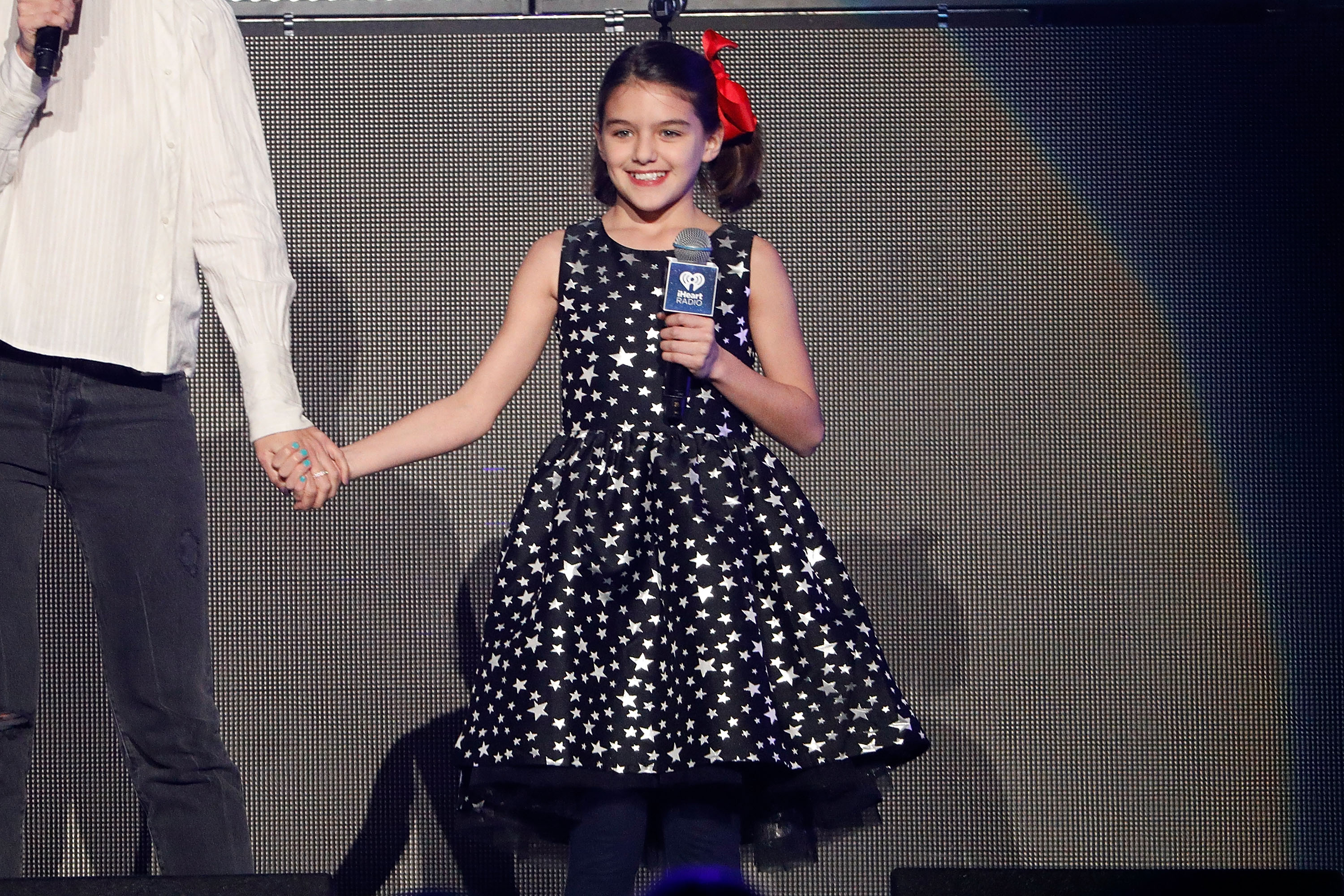 Katie Holmes and Suri Cruise perform during the 2017 Z100 Jingle Ball on December 8, 2017 in New York City | Source: Getty Images