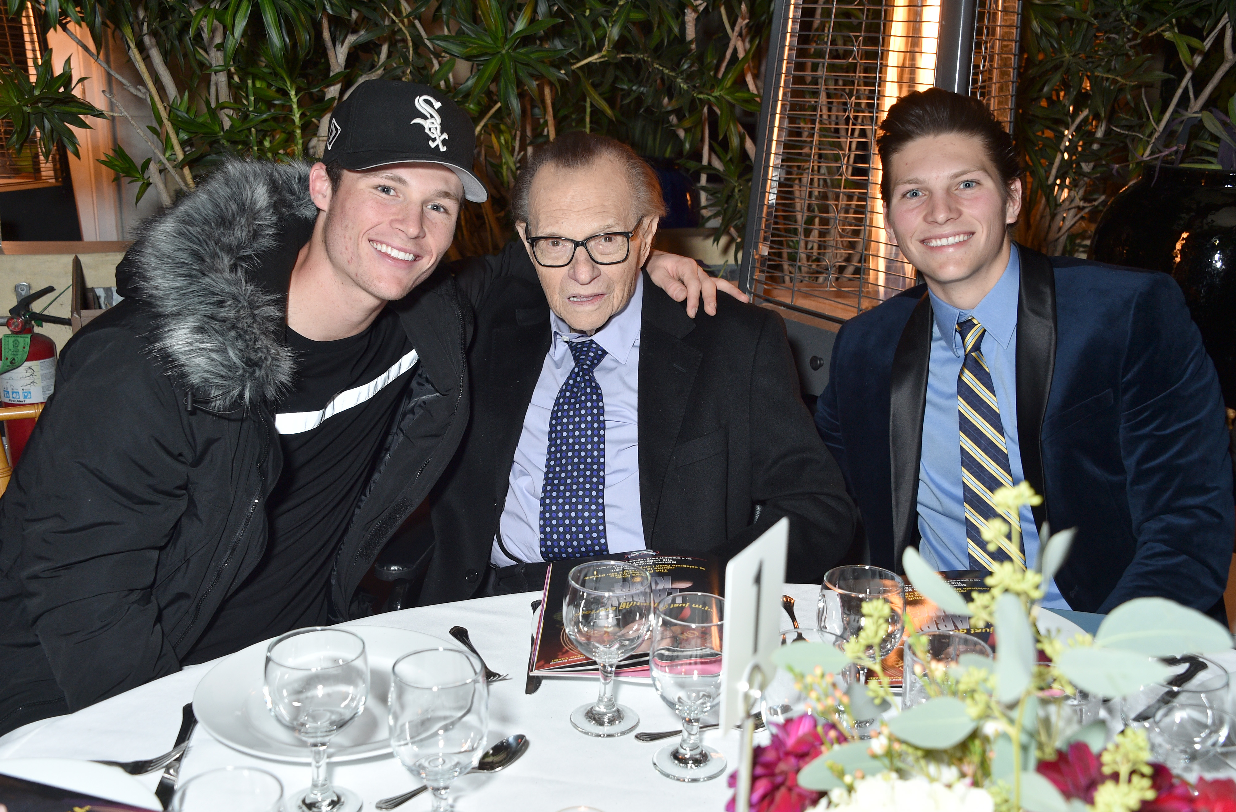 Cannon Edward, Larry, and Chance Armstrong King at the Friars Club honoring Larry King for his 86th birthday at The Crescent Hotel on November 25, 2019, in Beverly Hills, California. | Source: Getty Images