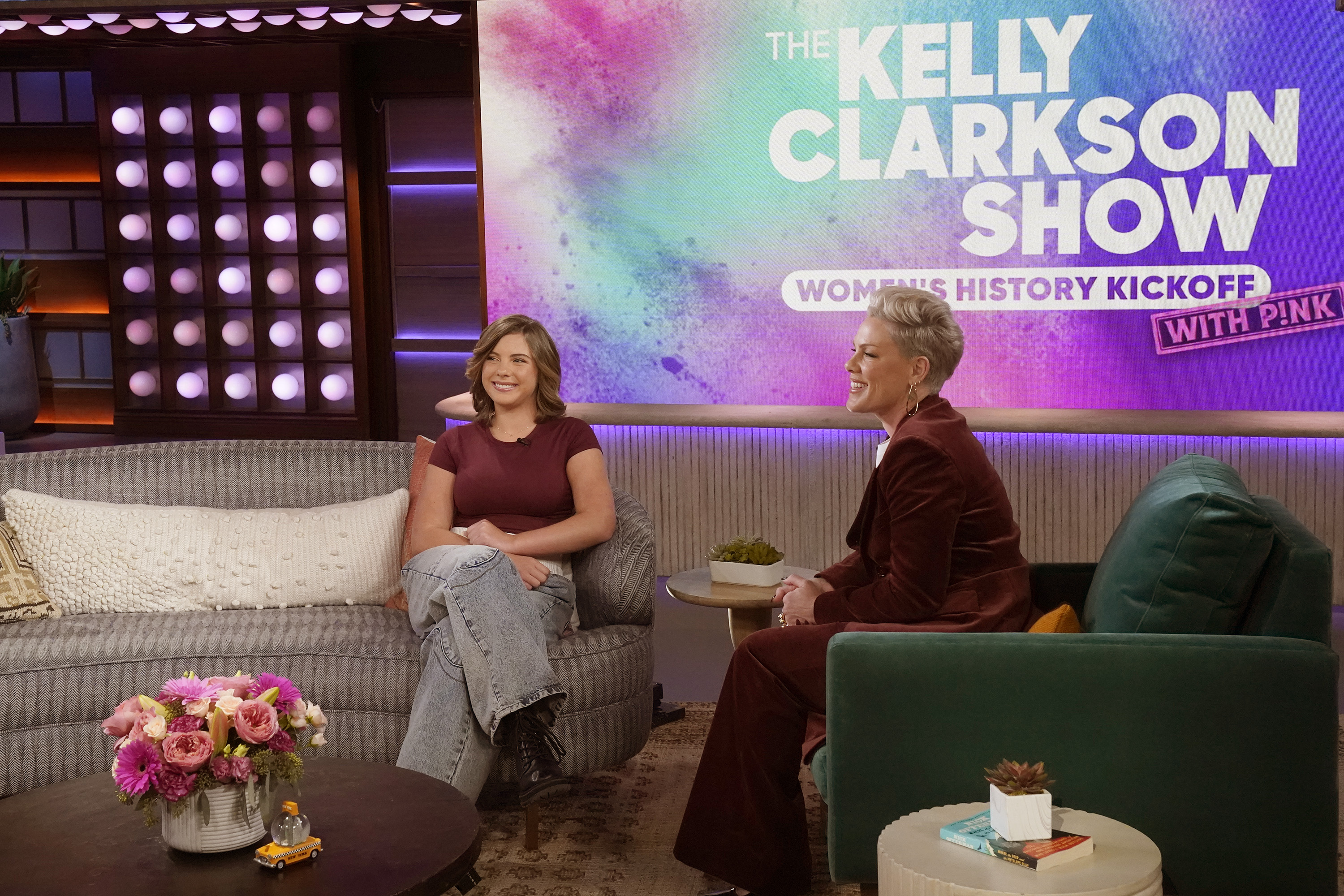 Photographed on "The Kelly Clarkson Show" on February 23, 2026, Willow Sage Hart sat across from her mother on the studio set, smiling with relaxed ease as the colourful backdrop lit up behind them. Dressed casually in a fitted top and jeans, she appeared comfortable in front of the cameras, sharing the spotlight in a setting that has long been second nature to her family.