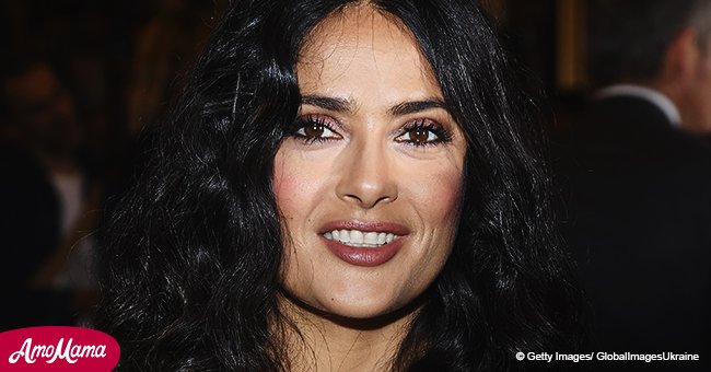 Salma Hayek, 51, shares stunning photo of herself in a plunging purple dress 