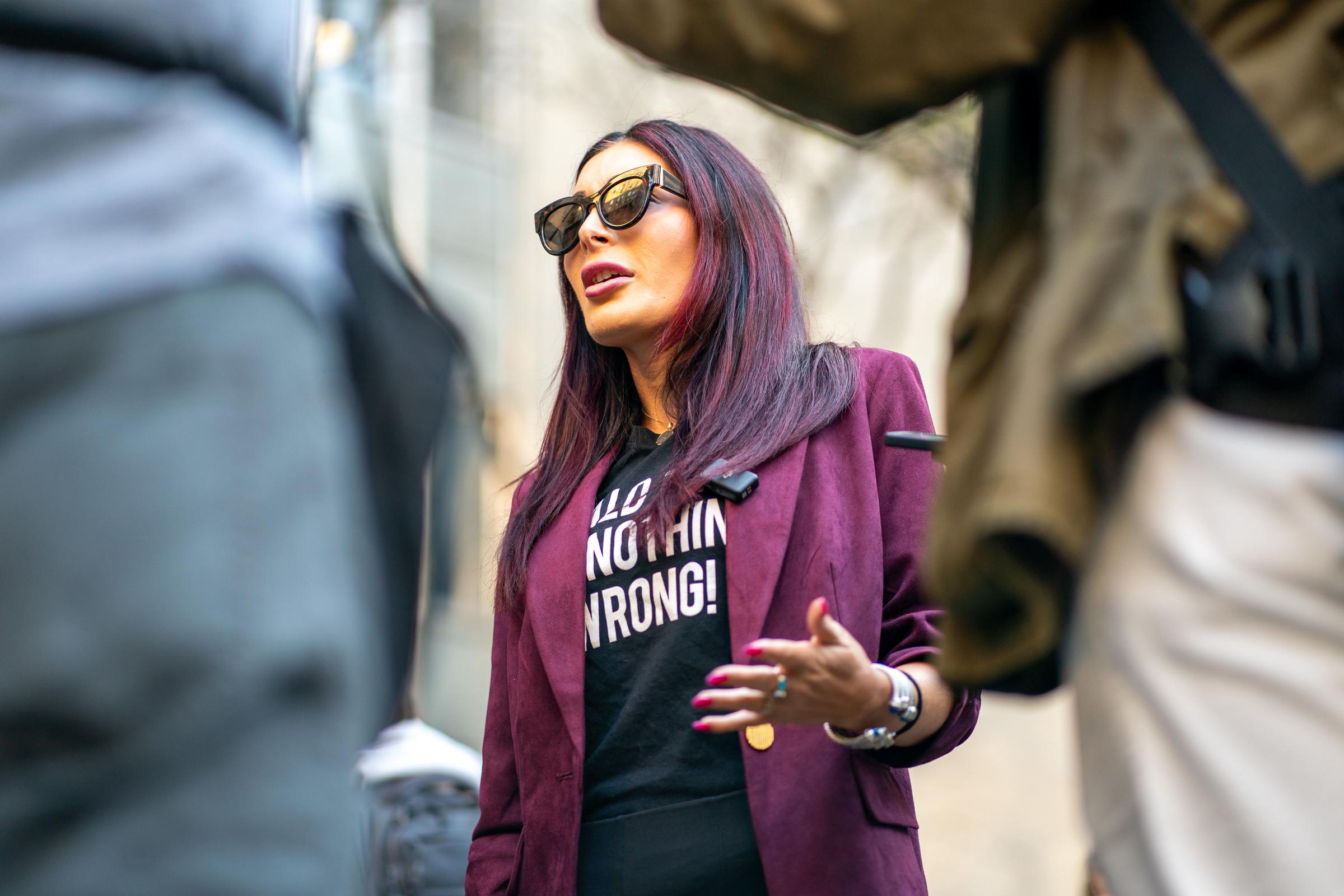 Laura Loomer had a lot to say regarding the sudden passing of Lindsey Graham. In this photo, she spoke to the media prior to the beginning of former President Donald Trump's trial at Manhattan Criminal Court on April 15, 2024, in New York City. | Source: Getty Images