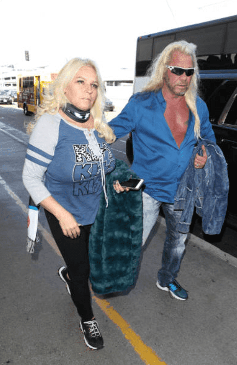 After surgery for her throat cancer, Duane "Dog" Chapman and Beth Chapman at LAX airport, on September 28, 2017, Los Angeles | Getty Images