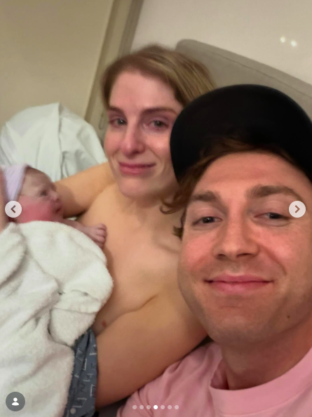 Meghan Trainor holding her baby girl, Mikey Moon Trainor, as Daryl Sabara poses next to them. | Source: Instagram/meghantrainor and darylsabara