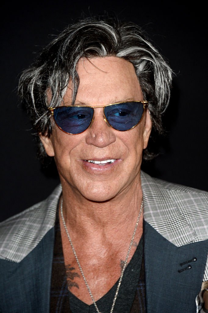 Mickey Rourke à l'avant-première de "Triple 9" au Regal Cinemas LA Live, à Los Angeles, Californie, le 16 fevrier 2016. | Getty Images Mickey Rourke à l'avant-première de "Triple 9" au Regal Cinemas LA Live, à Los Angeles, Californie, le 16 fevrier 2016. | Getty Images