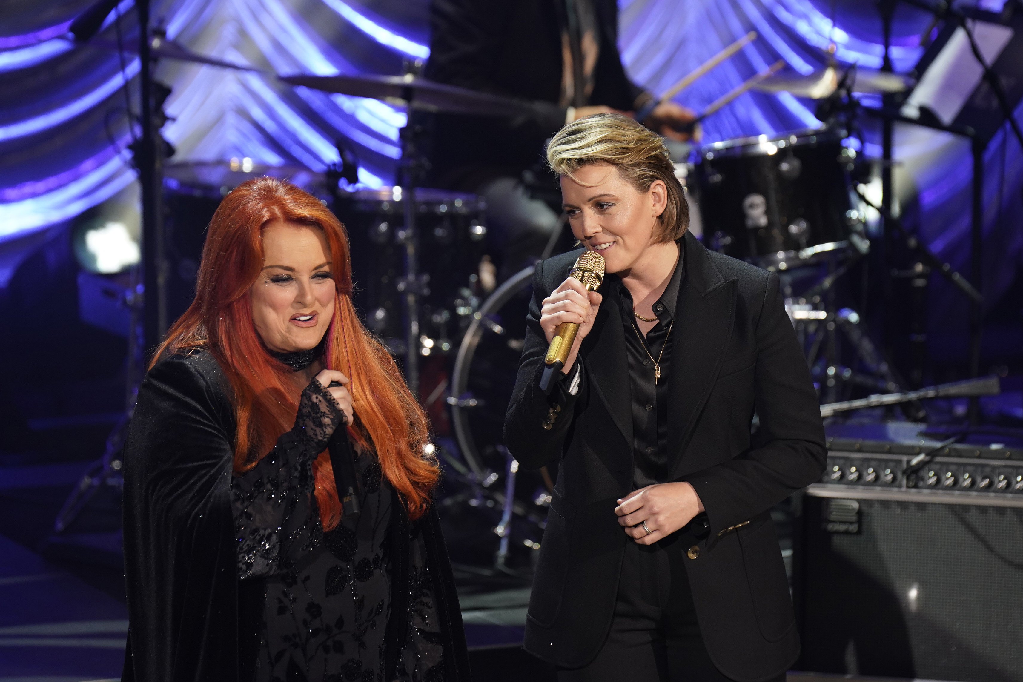 Wynonna Judd and Brandi Carlile perform onstage during the "Naomi Judd: 'A River Of Time'" Celebration on May 15, 2022, in Nashville, Tennessee. | Source: Mickey Bernal/Getty Images
