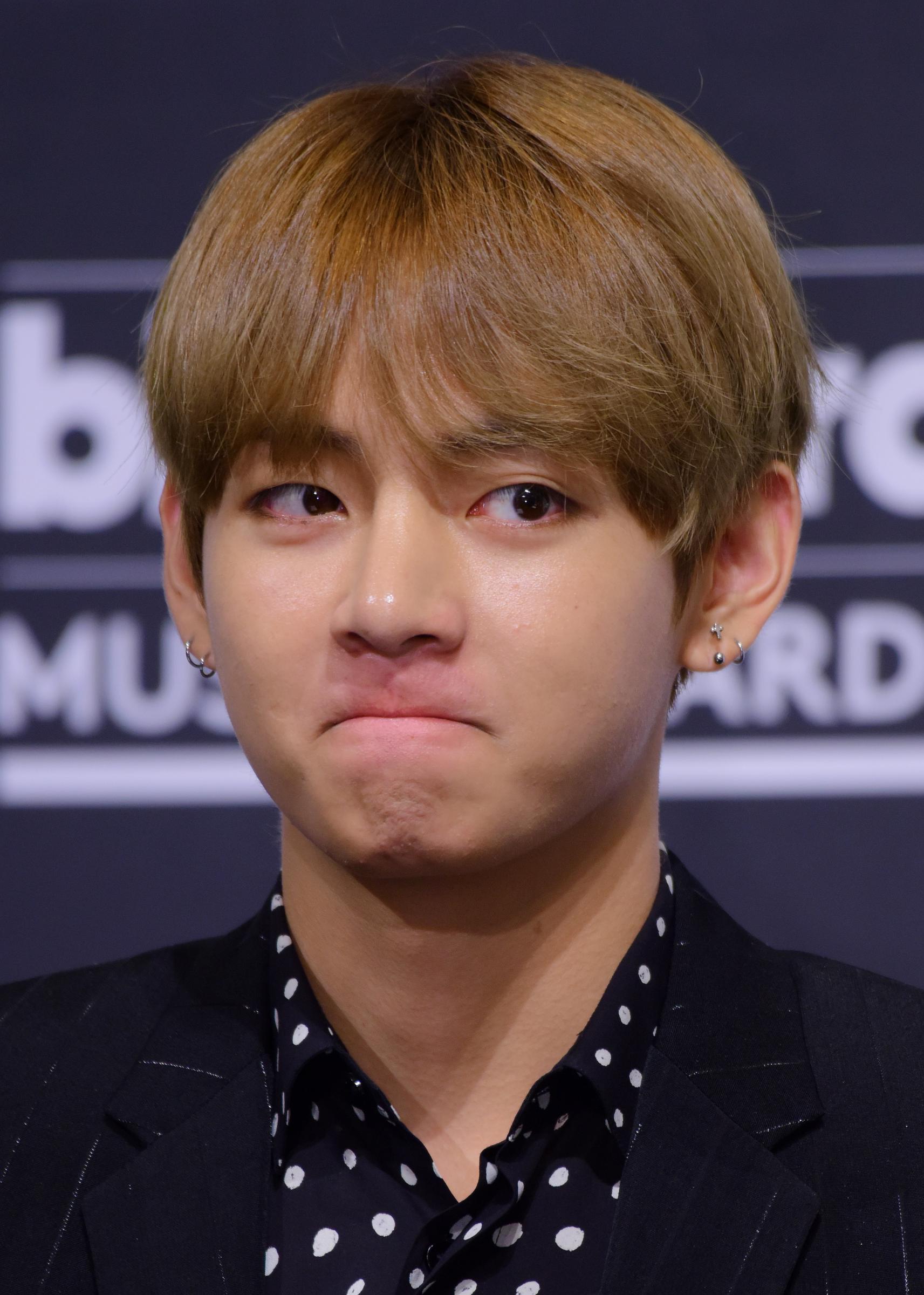 V of BTS attends the press conference for 2017 Billboard Music Award at Lotte Hotel Seoul on May 29, 2017, in Seoul, South Korea | Source: Getty Images