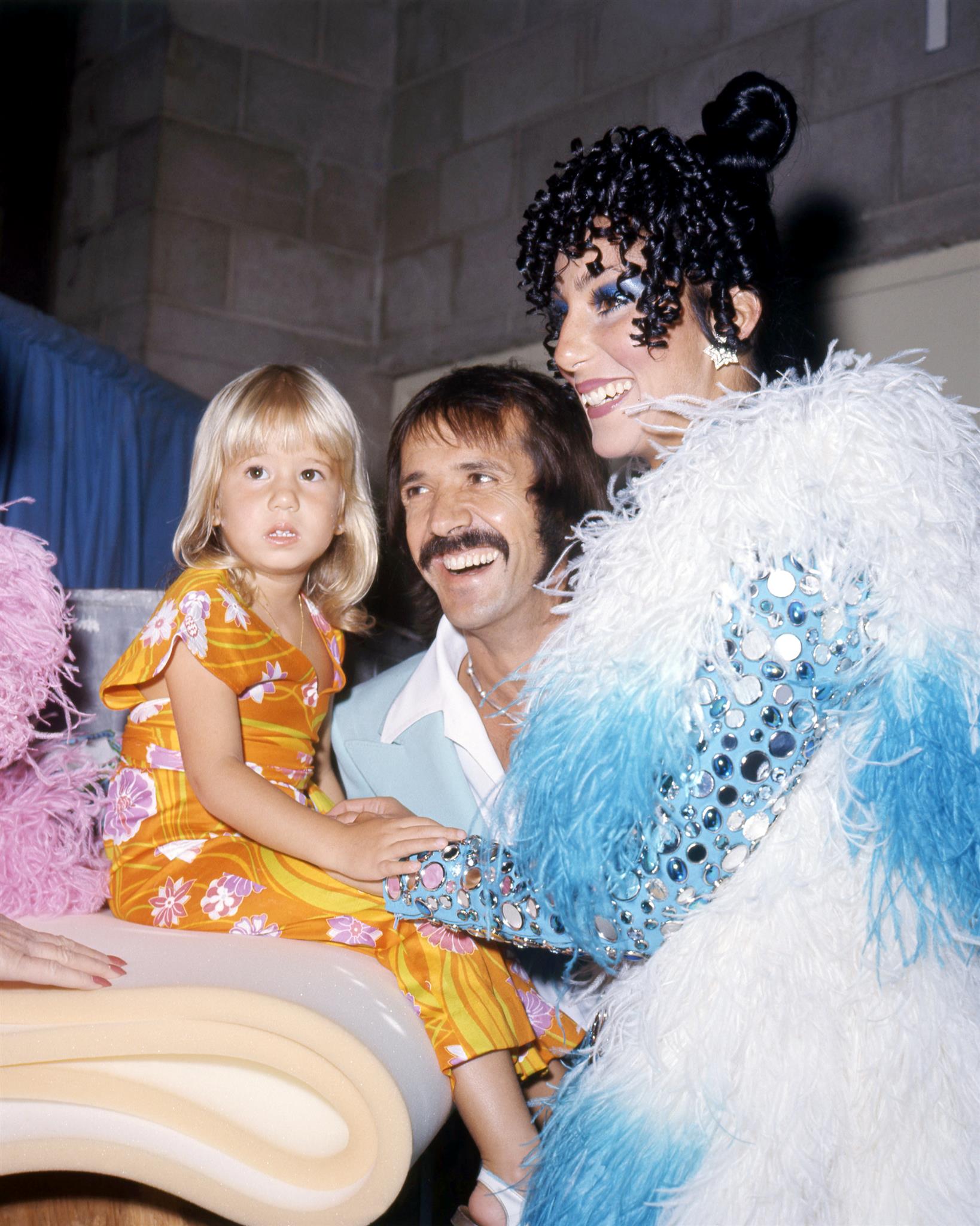 American pop singing duo Sonny & Cher with their daughter Chastity (later Chaz), circa 1973. | Source: Getty Images.