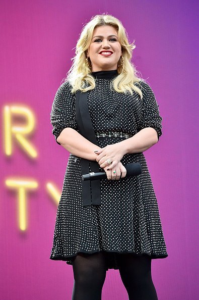 Kelly Clarkson speaking onstage at the 2019 Global Citizen Festival: Power The Movement in New York City. | Photo: Getty Images.