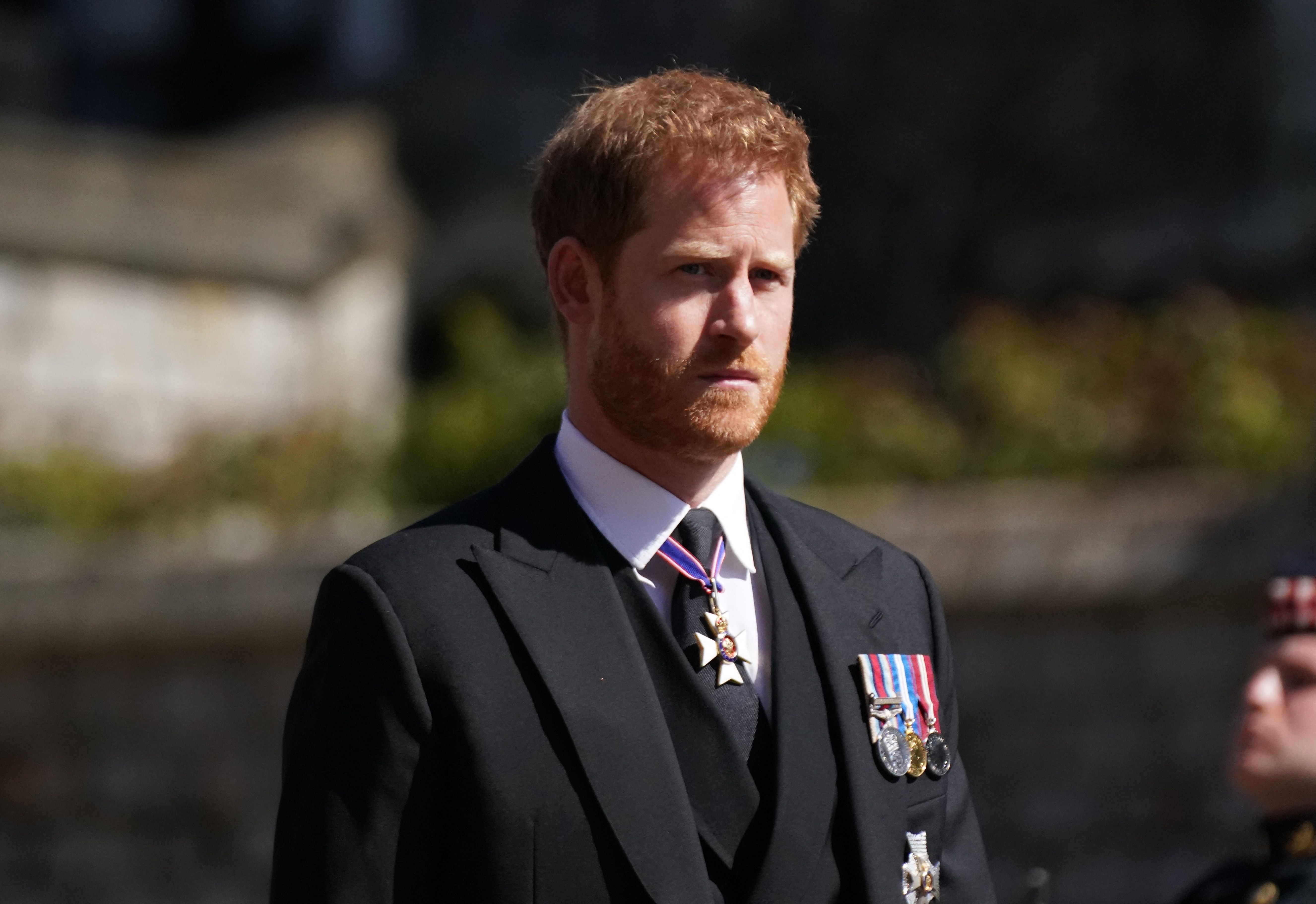Britain's Prince Harry, Duke of Sussex walks during the funeral procession of Britain's Prince Philip, Duke of Edinburgh to St George's Chapel in Windsor Castle in Windsor, west of London, on April 17, 2021. | Getty Images