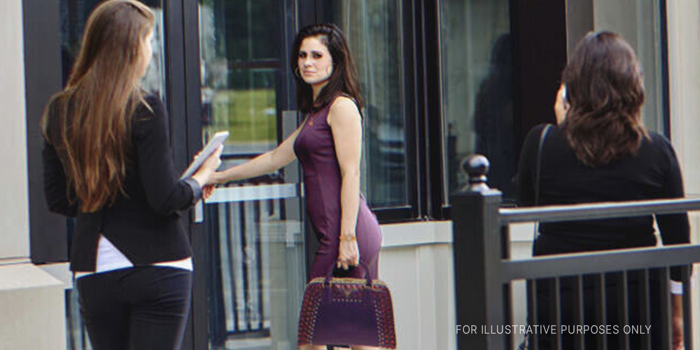 Woman entering an office | Source: Shutterstock 