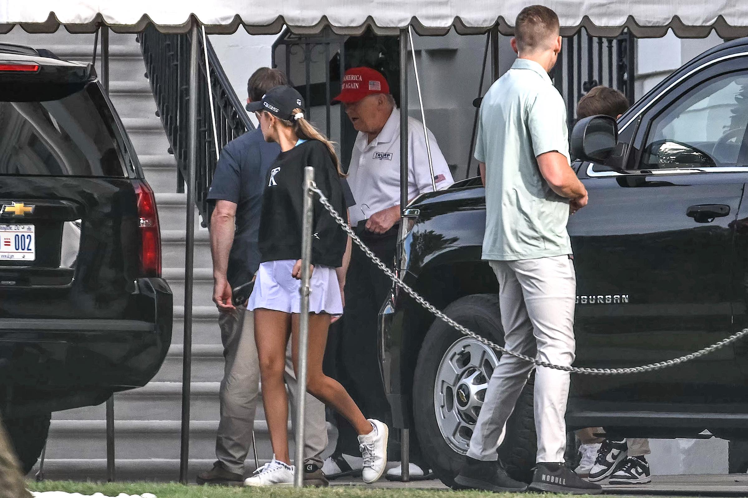 President Donald Trump and his granddaughter, Kai Trump, on the south lawn of the White House in Washington, D.C, on August 30, 2025. | Source: Getty Images