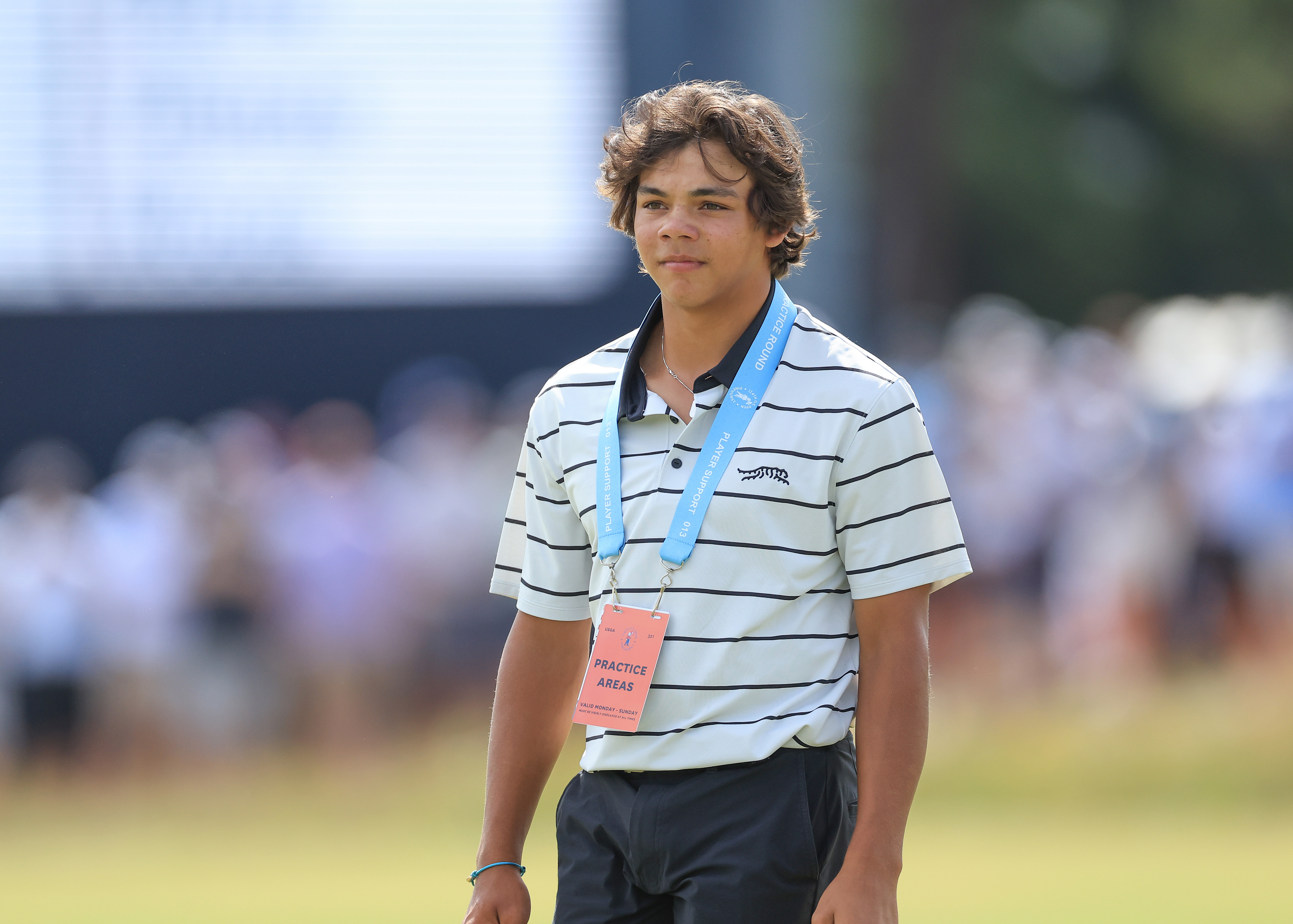 Charlie Woods stands on the 18th green at Pinehurst during a U.S. Open practice round on June 10, 2024. Representing the next generation, he looked focused and composed.