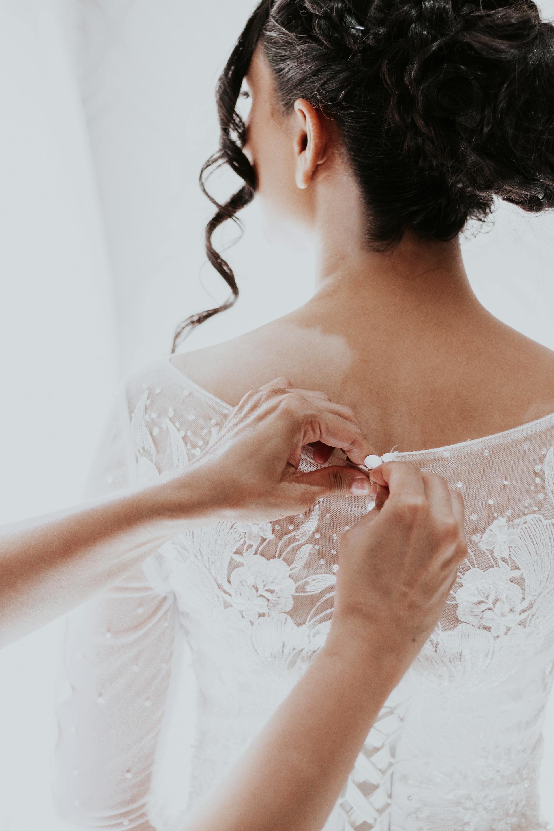 A bride getting dressed | Source: Pexels