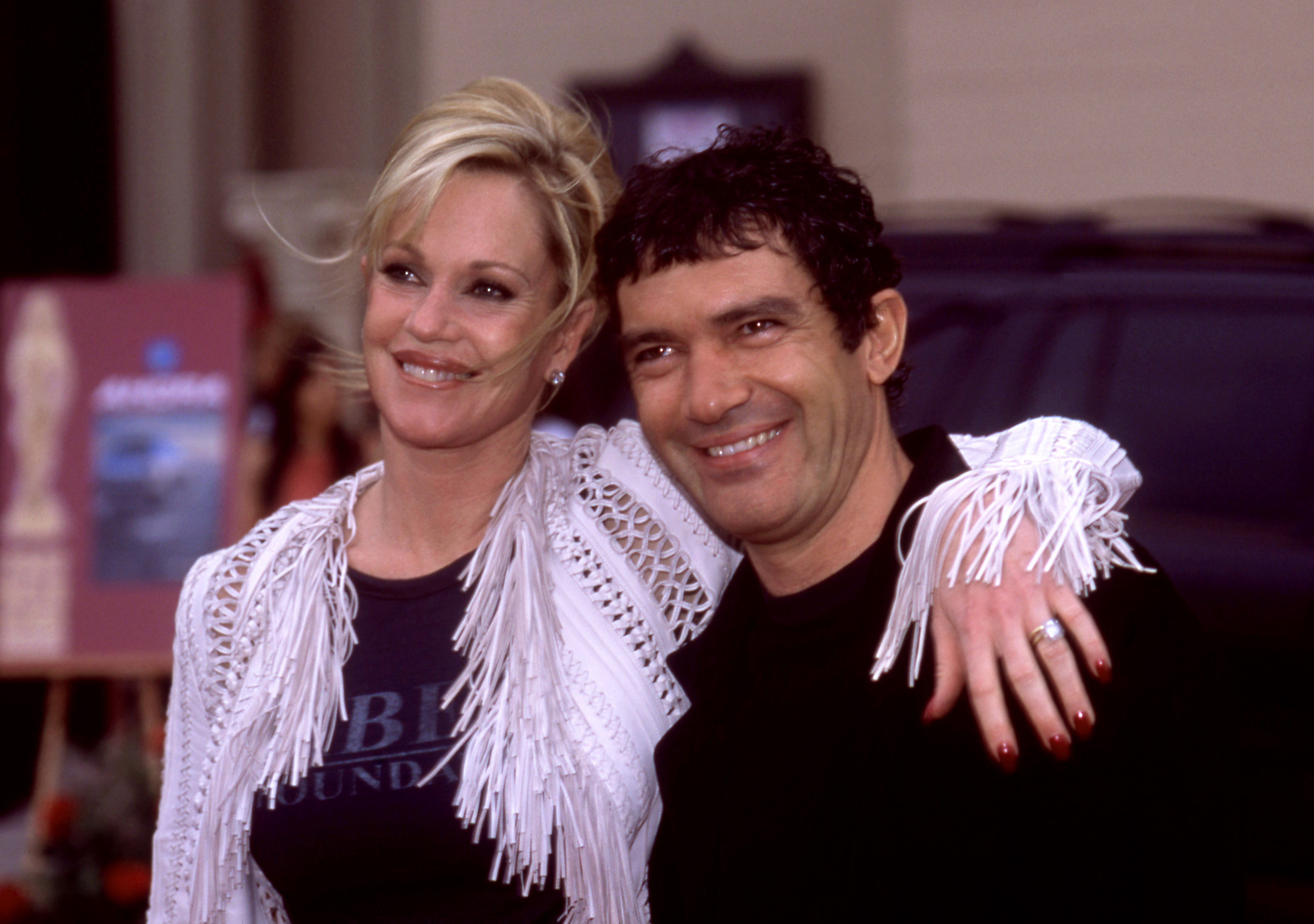 Melanie Griffith and Antonio Banderas pose for a portrait before the 2002 American Latino Media Arts Awards in Los Angeles, California on May 18 | Source: Getty Images