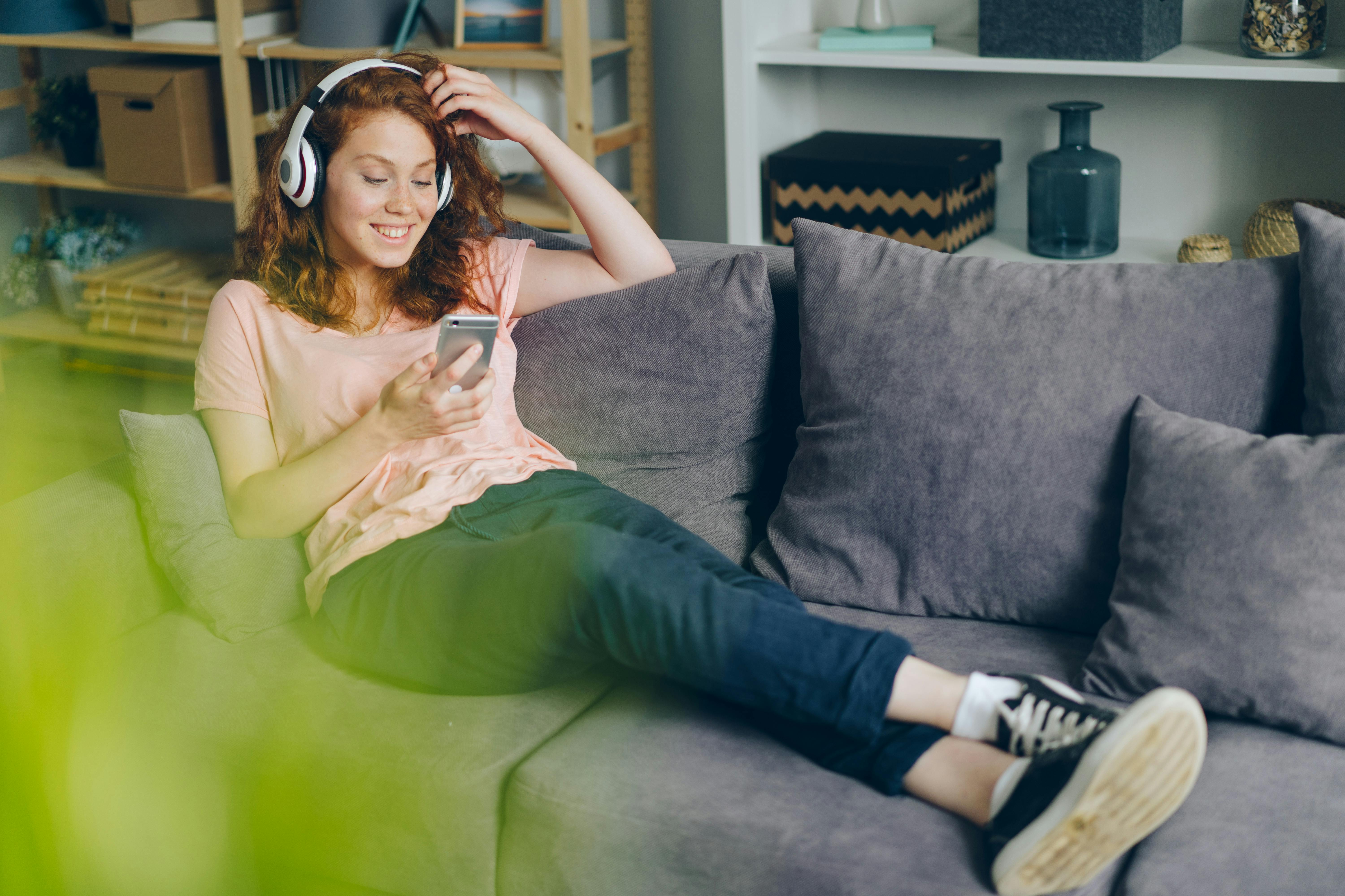 A young woman relaxes at home | Source: Pexels