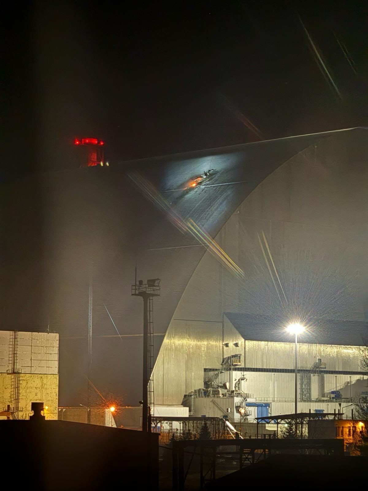 The part of the roof of the New Safe Confinement that was damaged during a drone strike in Ukraine, from a post dated February 14, 2025 | Source: X/iaeaorg