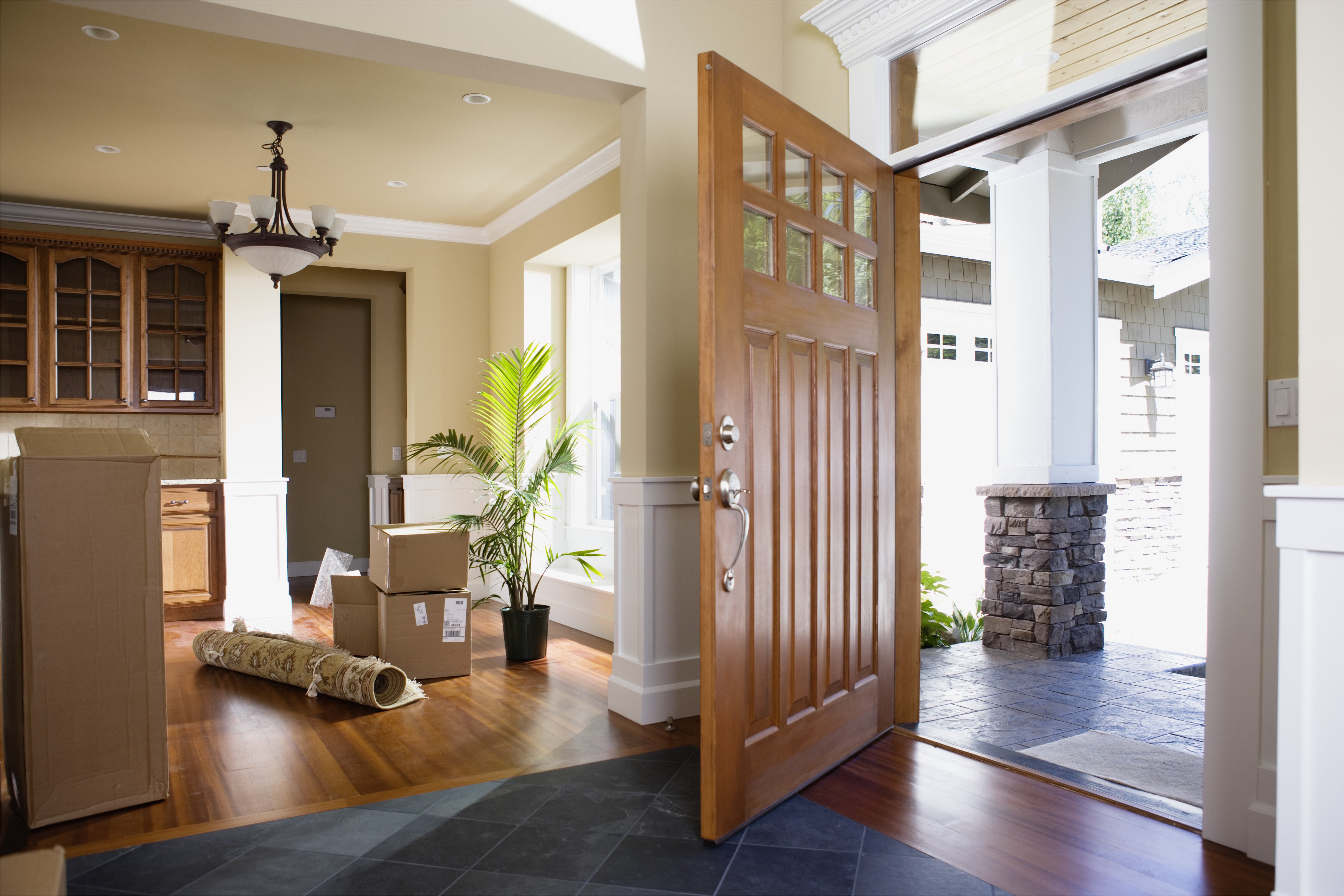 The open front door inside a home | Source: Getty Images