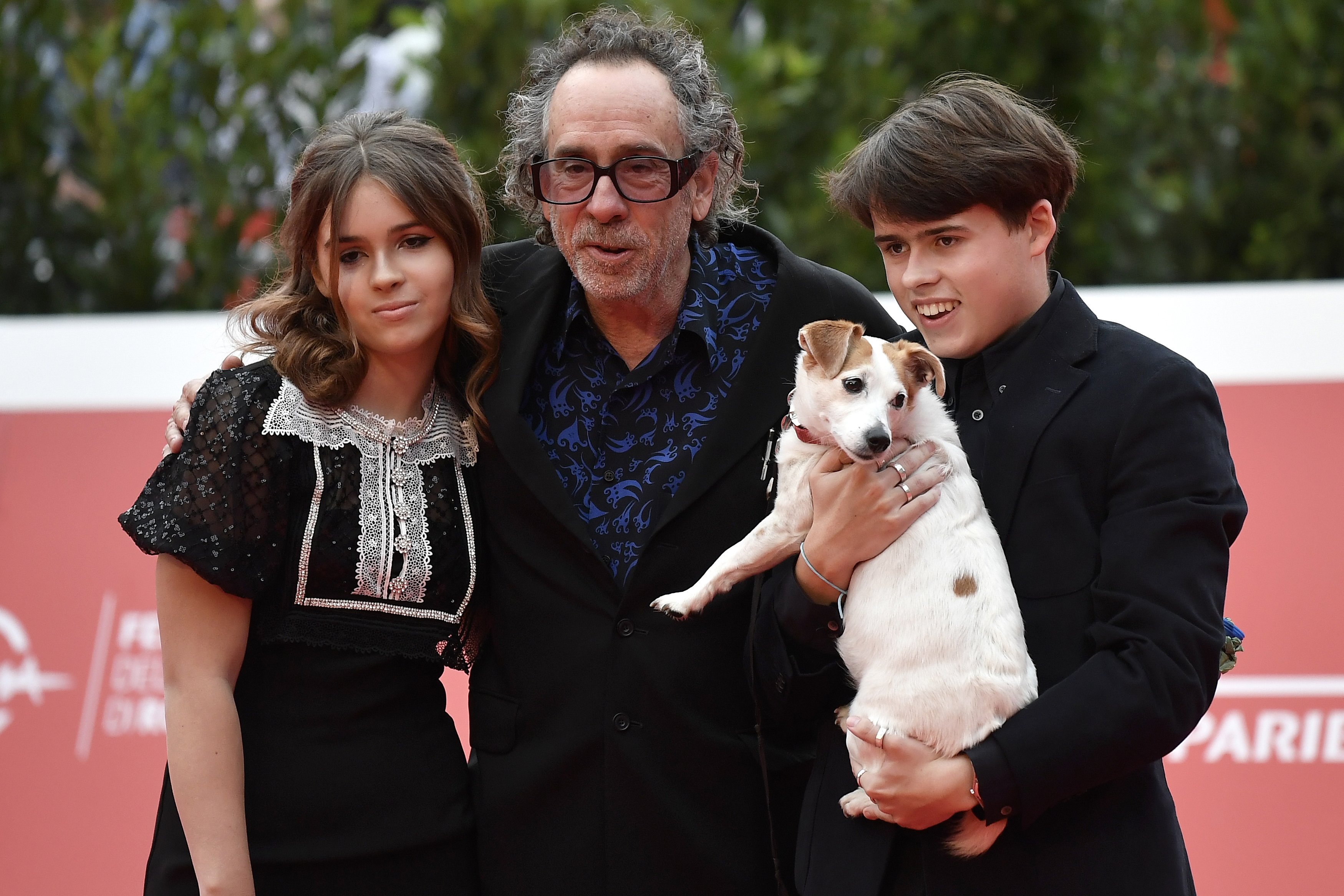 Tim Burton and Nell Burton, and Billy-Ray Burton at Rome Film Fest 2021. Tim Burton Close Encounter Red carpet in Rome, October 23, 2021. | Source: Getty Images