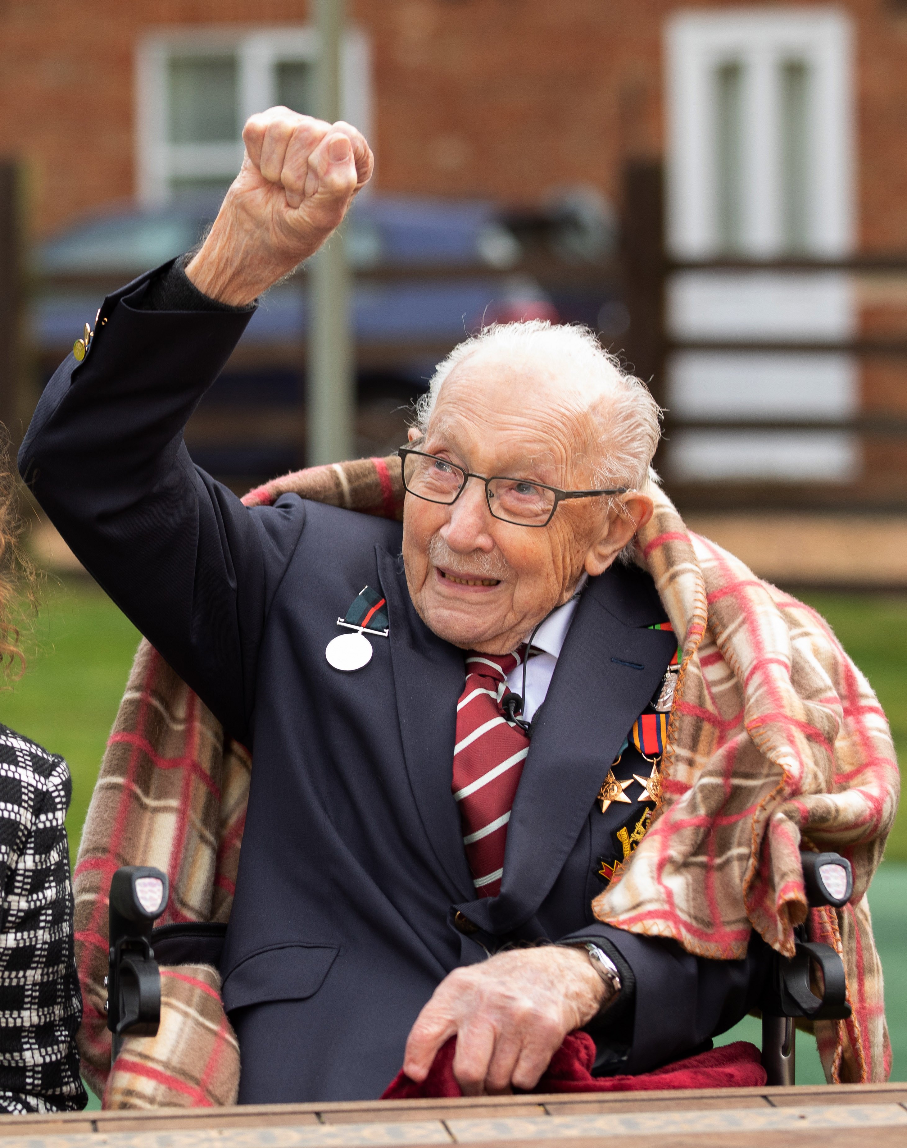 Colonel Tom Moore and his daughter Hannah celebrate his 100th birthday on April 30, 2020, in Marston Moretaine, England. | Source: Getty Images.