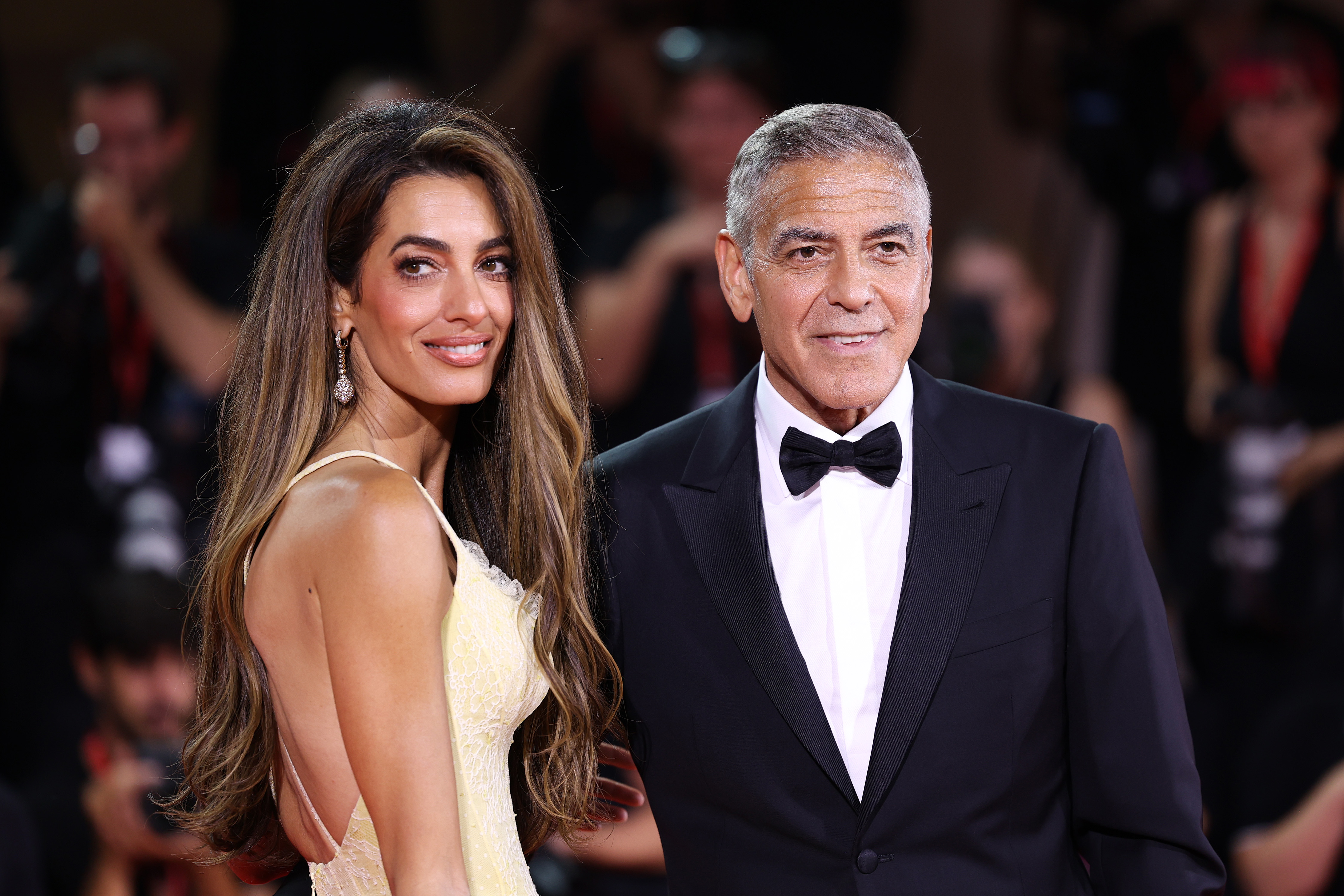 Amal and George Clooney on the "Wolfs" premiere red carpet on September 1, 2024 | Source: Getty Images