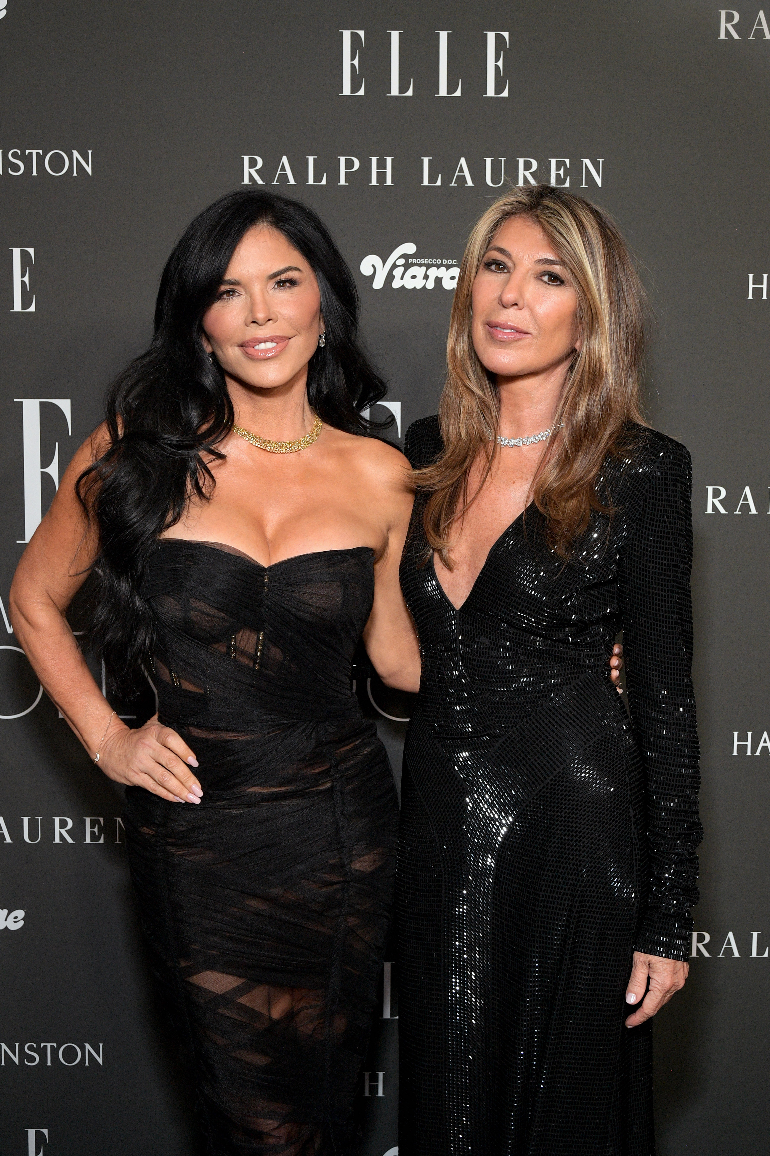 Lauren Sánchez and Elle Editor in Chief Nina García during ELLE's 2023 Women in Hollywood Celebration Presented by Ralph Lauren, Harry Winston and Viarae at Nya Studios on December 5, 2023, in Los Angeles, California | Source: Getty Images