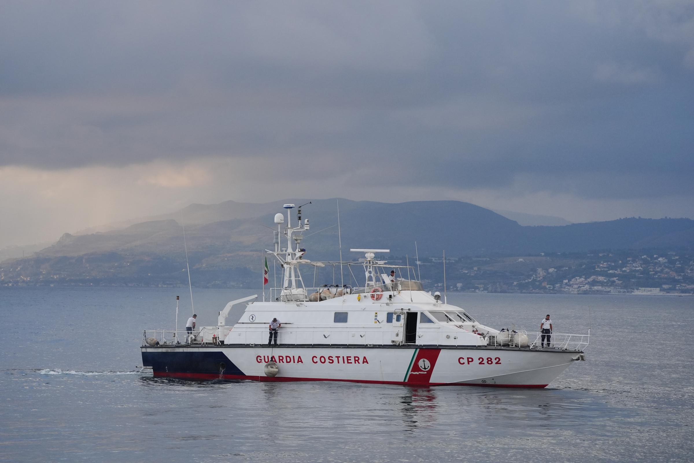 An Italian Coastguard boat heads out to the site of the Bayesian on the fourth day of the search and recovery operation off the coast of Porticello, Sicily, on August 22, 2024. | Source: Getty Images