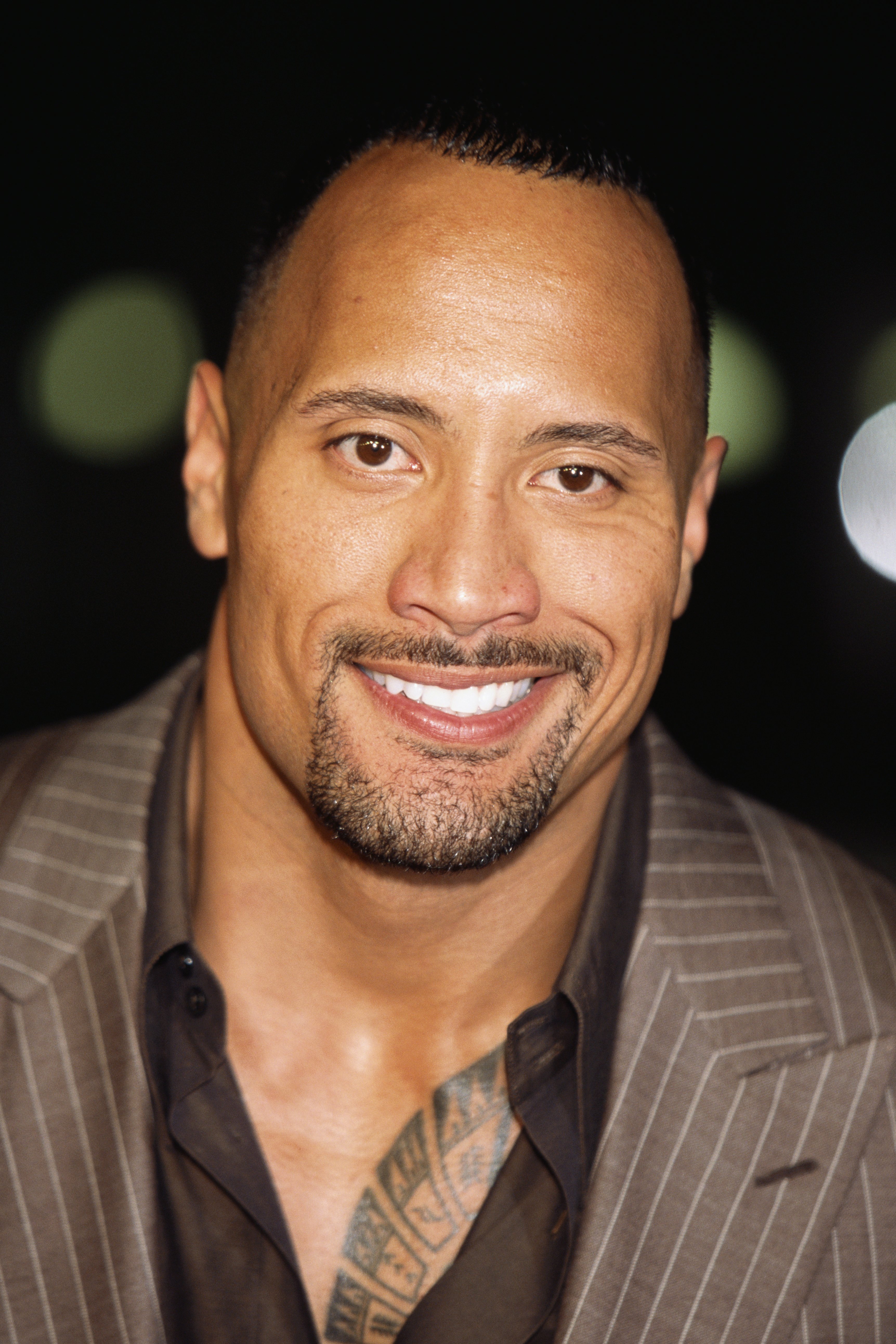 An undated and unspecified colour photo of Dwayne Johnson when he was younger | Source: Getty Images
