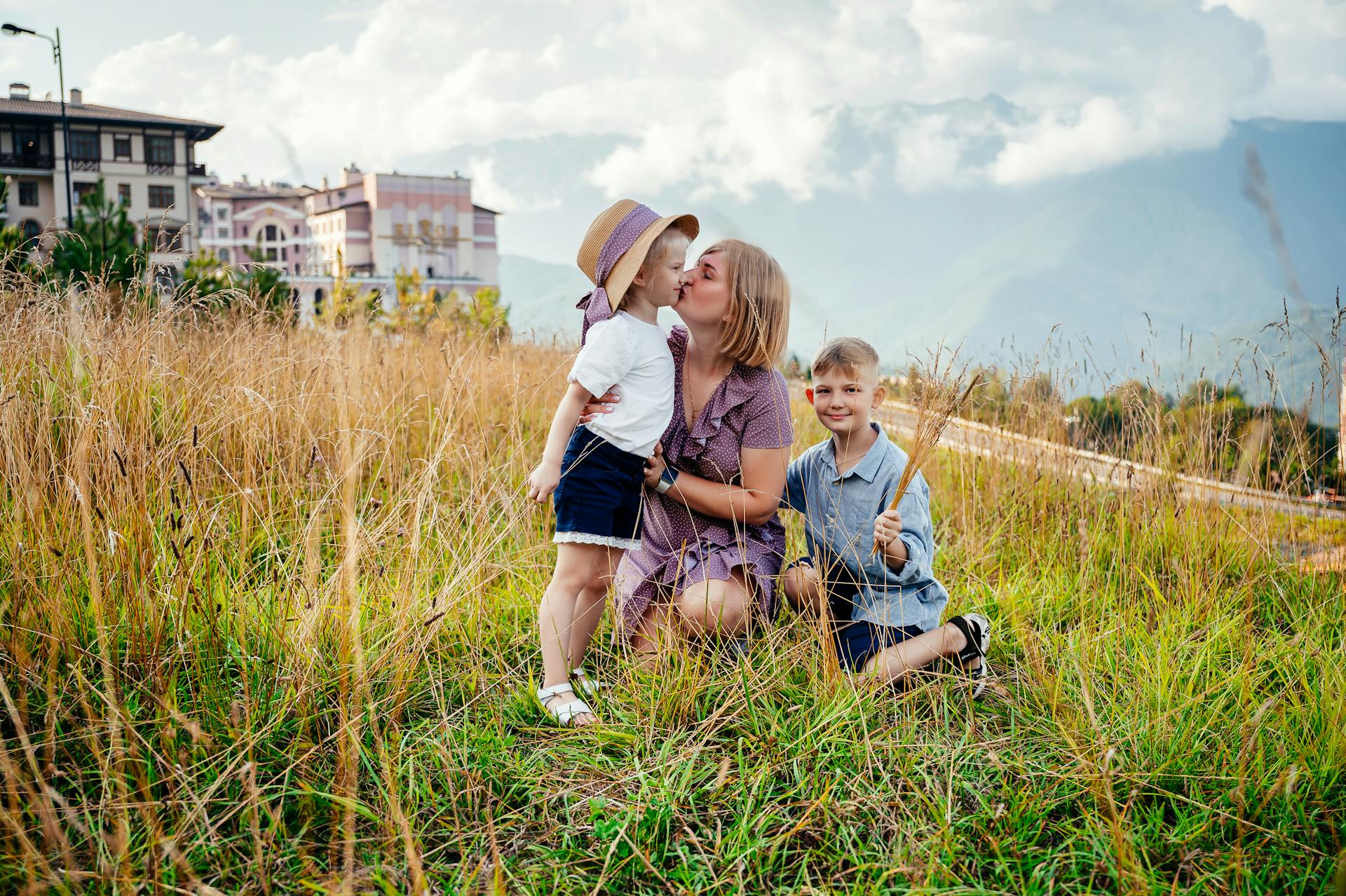 A mother with her young son and daughter | Source: Pexels