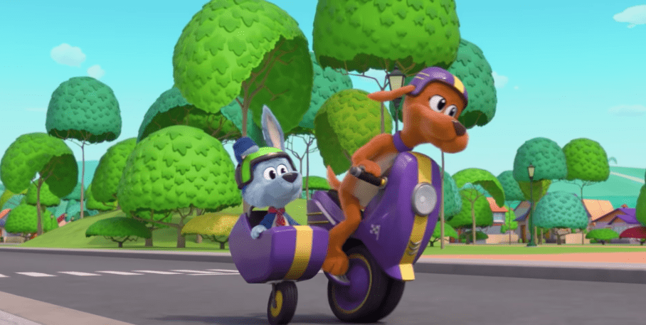 Tag Barker (Michaela Luci) and her best friend Scooch Pooch (Callum Shoniker) riding Tag's motorcycle in Netflix's "Go, Dog. Go," released on January 26, 2021. | Image: YouTube/Gabby & Friends.