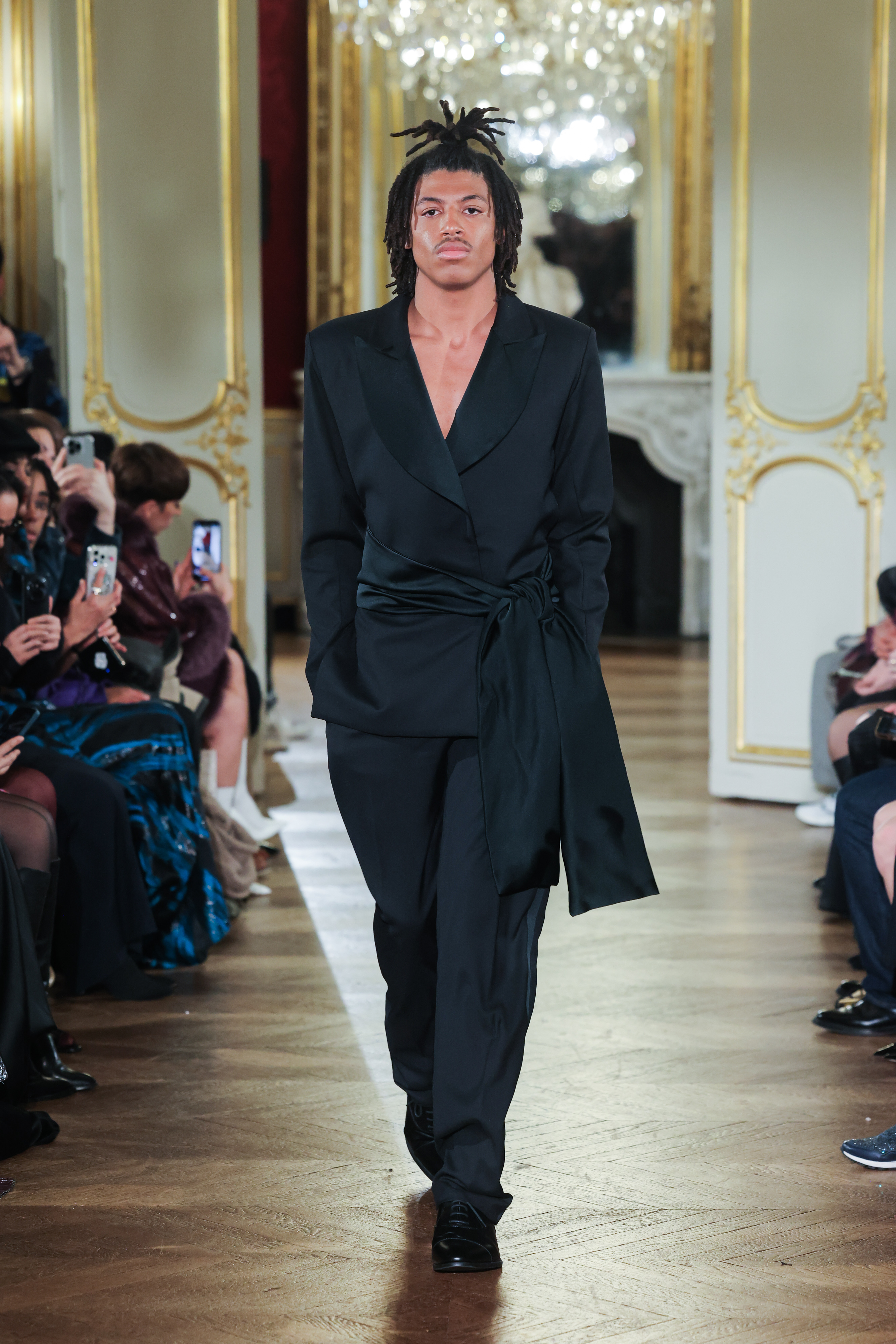 Henry Samuel walks the Lena Erziak show at Paris Fashion Week on  January 28, 2025 | Source: Getty Images