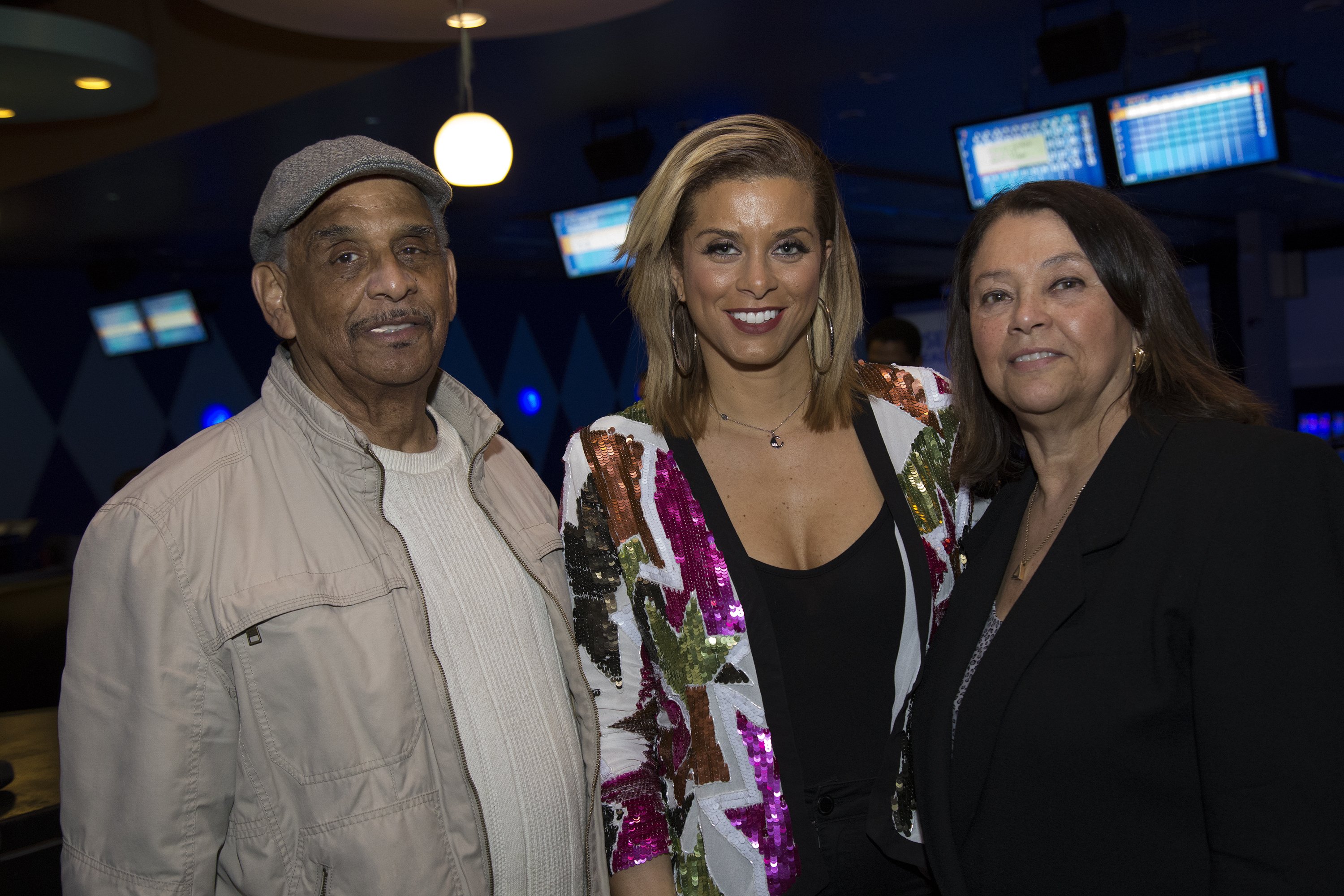 Robyn Dixon, Guy Bragg, and Gladys Bragg at  "Bowl For Kids' Sake" at Dave & Busters in Hanover, Maryland, on March 31, 2017. | Source: Getty Images 