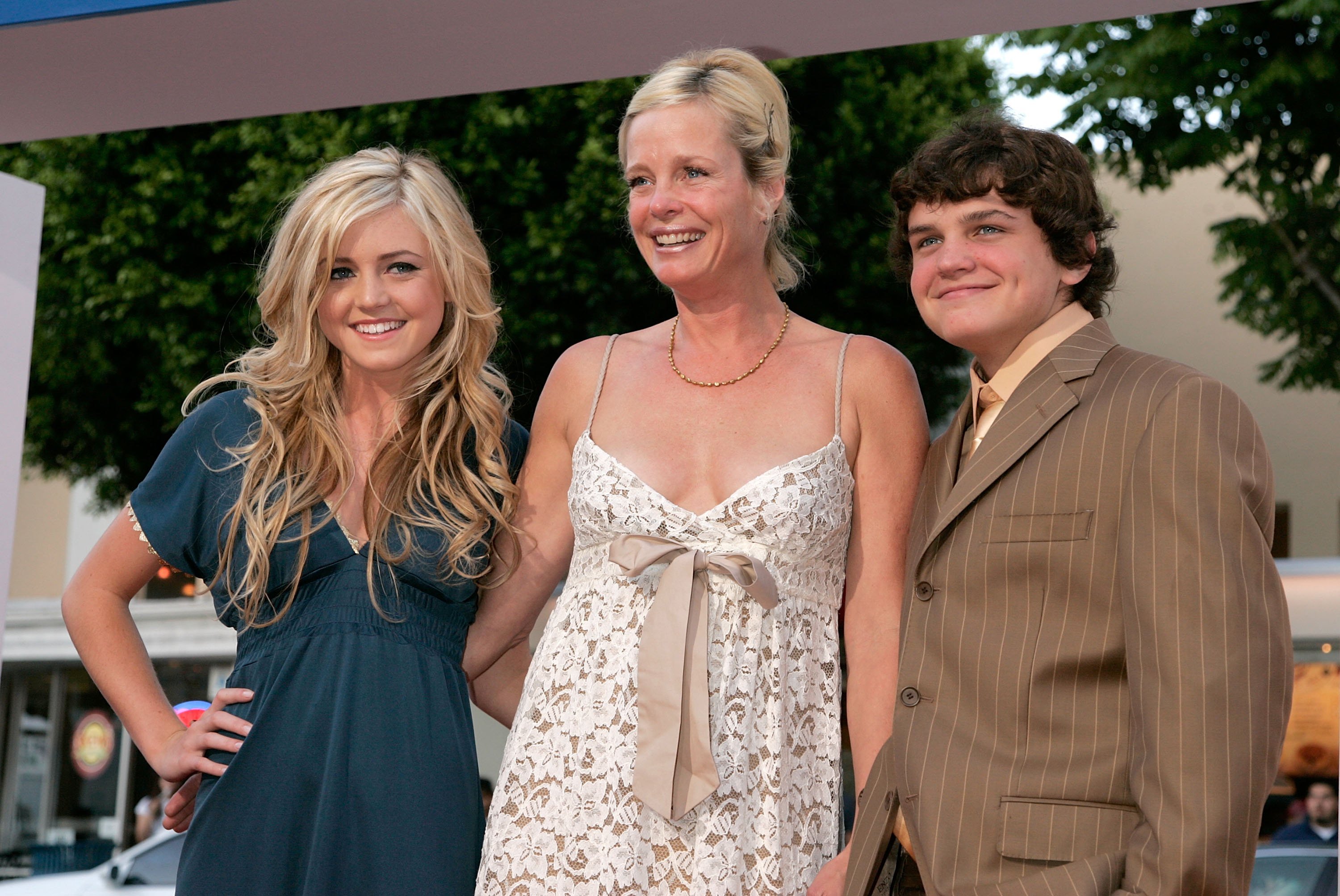 Actress Lorraine Nicholson, mother actress Rebecca Broussard and her son Raymond Nicholson arrive at Sony Pictures premiere of "Click" held at the Mann Village Theater on June 14, 2006, in Westwood, California. | Source: Getty Images.