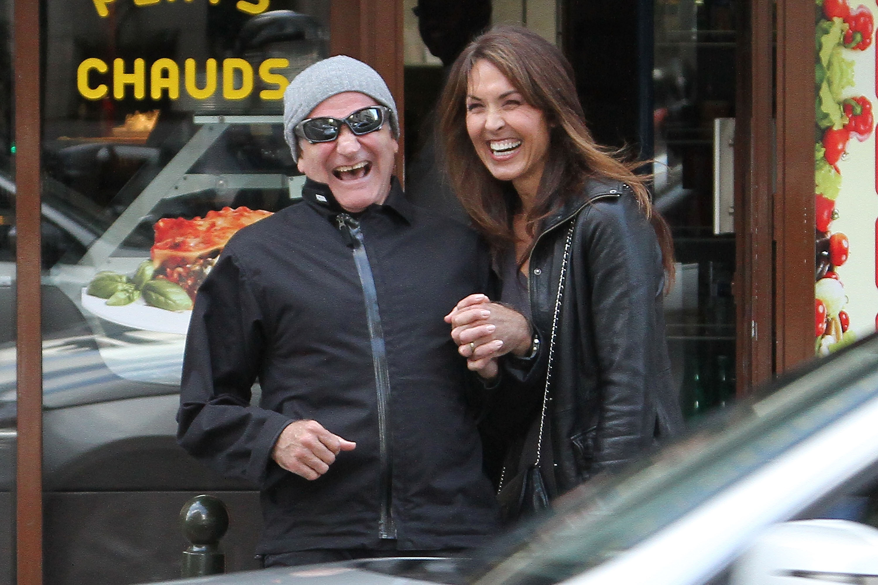 Robin Williams and Susan Schneider in Paris in October, 2011 | Source: Getty Images