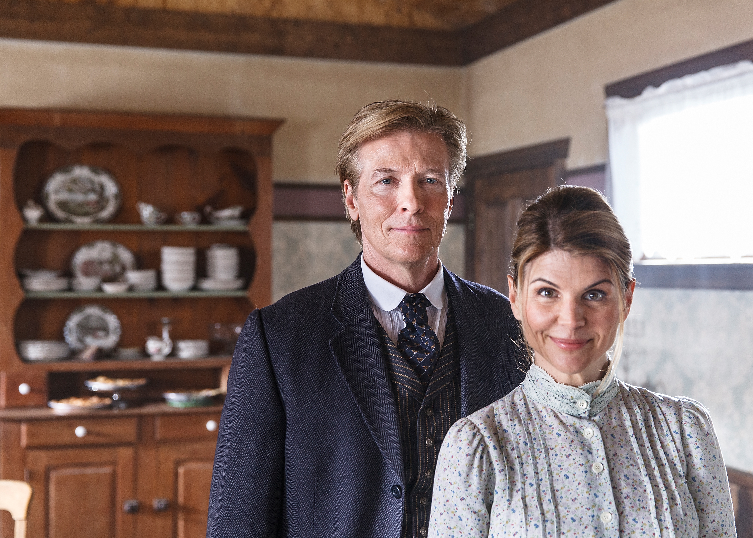 Jack Wagner and Lori Loughlin on the set of "When Calls the Heart," 2014 | Source: Getty Images