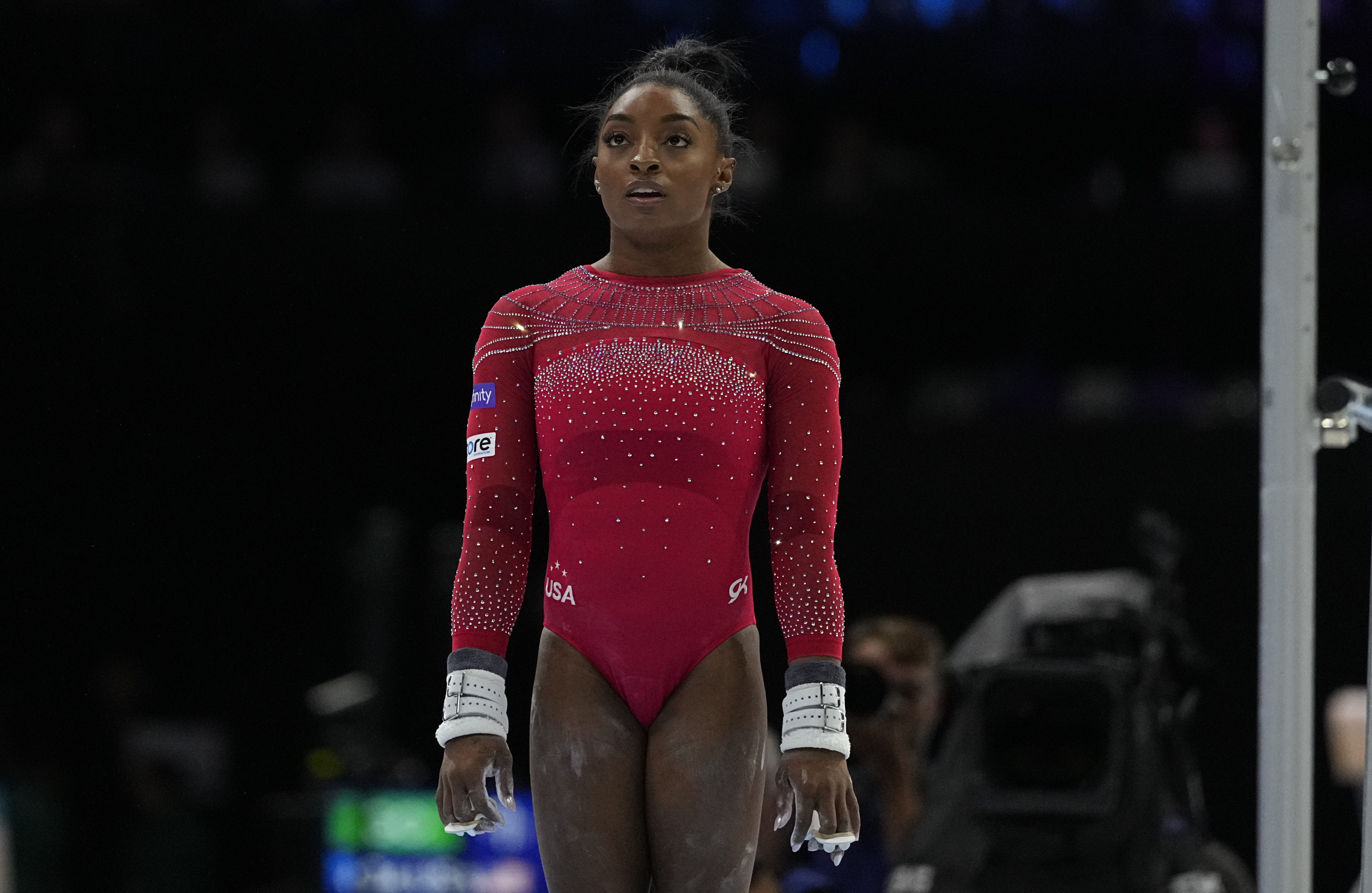 Biles prepares to compete on the uneven bars during the 2023 FIG Artistic Gymnastics World Championships at Antwerp Sportpaleis on October 7, in Antwerp, Belgium. With chalked hands and laser focus, the American powerhouse continued her stunning comeback on the global stage.