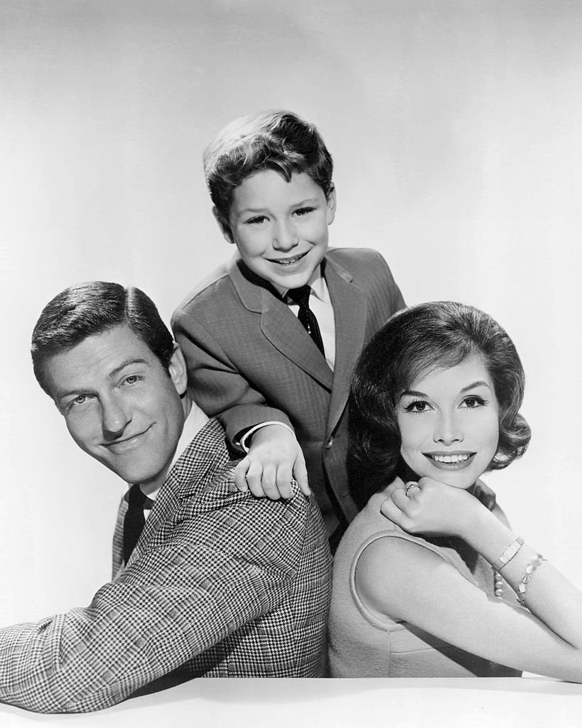 Dick Van Dyke, Larry Mathews, and Mary Tyler Moore, in a promotional portrait for "The Dick Van Dyke Show," circa 1965 | Photo: Getty Images