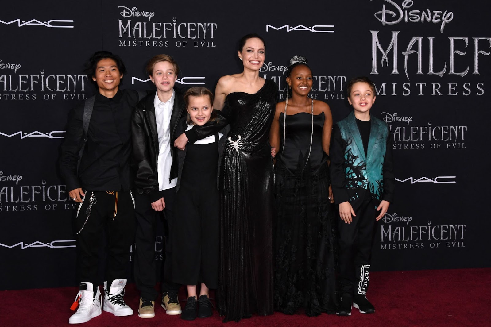 Angelina Jolie with her children Pax, Shiloh, Vivienne, Zahara, and Knox Jolie-Pitt at the world premiere of "Maleficent: Mistress of Evil" at the El Capitan Theatre on September 30, 2019. | Source: Getty Images