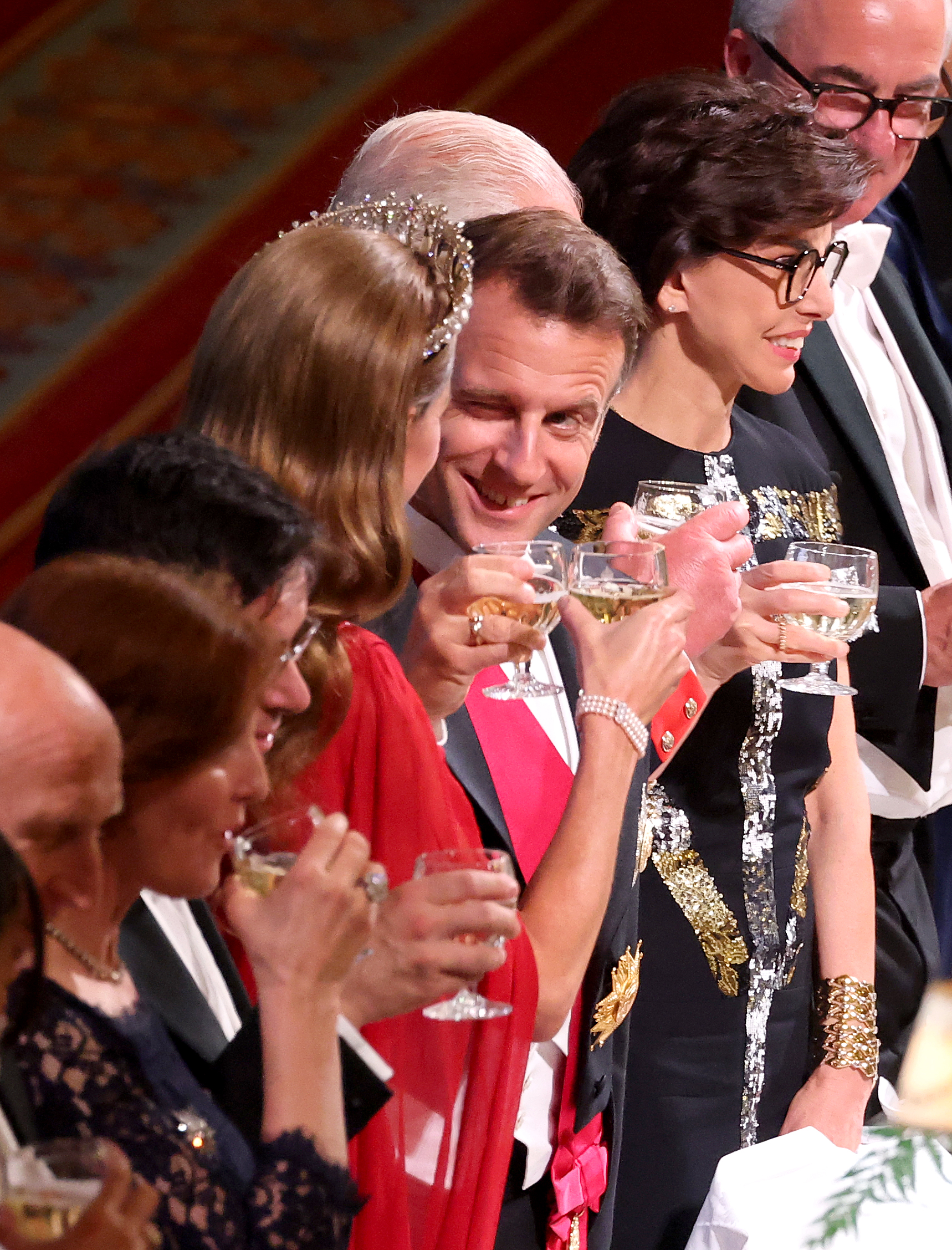 President Emmanuel Macron winking at Catherine, Princess of Wales, during the State Banquet at Windsor Castle on July 8, 2025. | Source: Getty Images