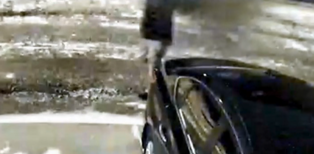 The person of interest is seen moving past a parked car near the Tepe residence Source: Facebook/ColumbusPolice