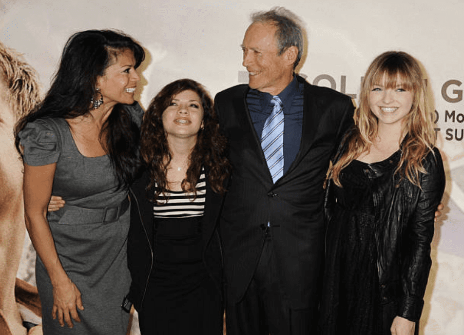 Dina Ruiz and Clint Eastwood with daughters Morgan and Francesca arrive at the UK film premiere of "Invictus," 2010, London, England. | Photo: Getty Images