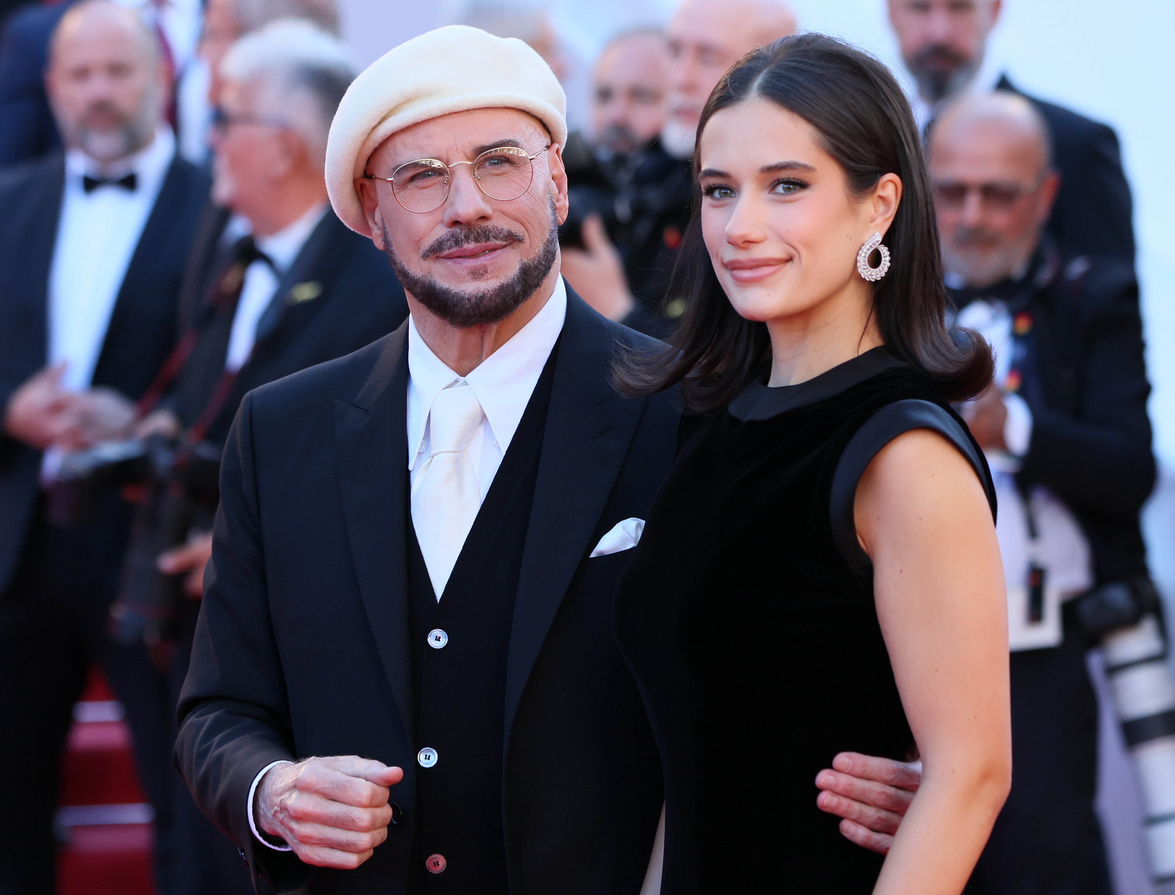 Ella Bleu and John Travolta attends the "Karma" screening during the 79th annual Cannes Film Festival at Palais des Festivals on May 15, 2026 in Cannes, France. | Source: Getty Images